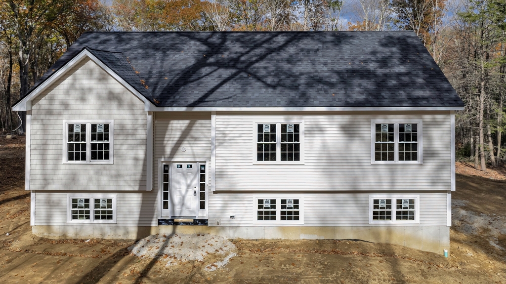 87 Vinton Road Sturbridge, MA 01566 - Photo 1 of 20 a view of residential houses with wooden fence
