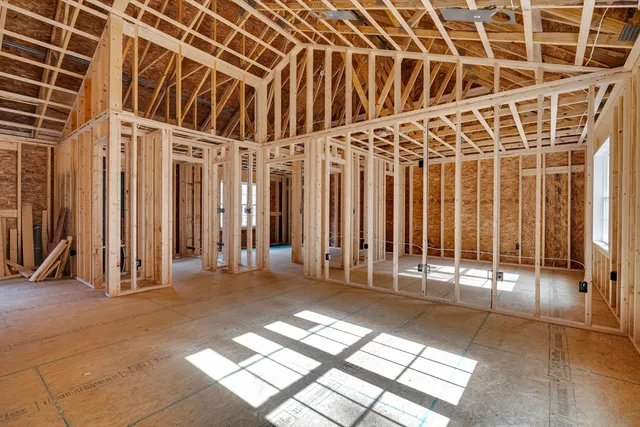 a view of a hall with wooden floor