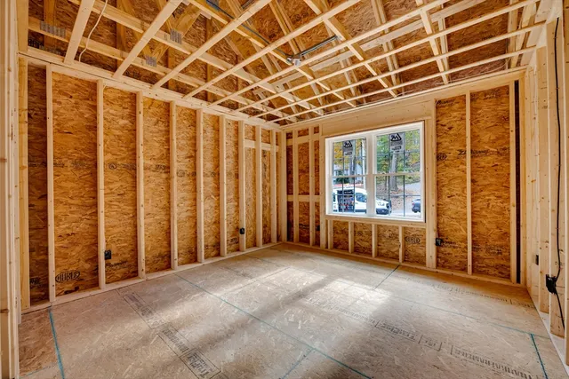 a view of a room with wooden walls