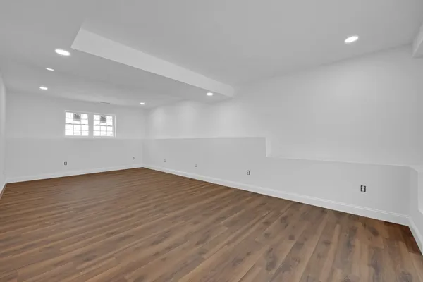 a view of a house with a yard and garage