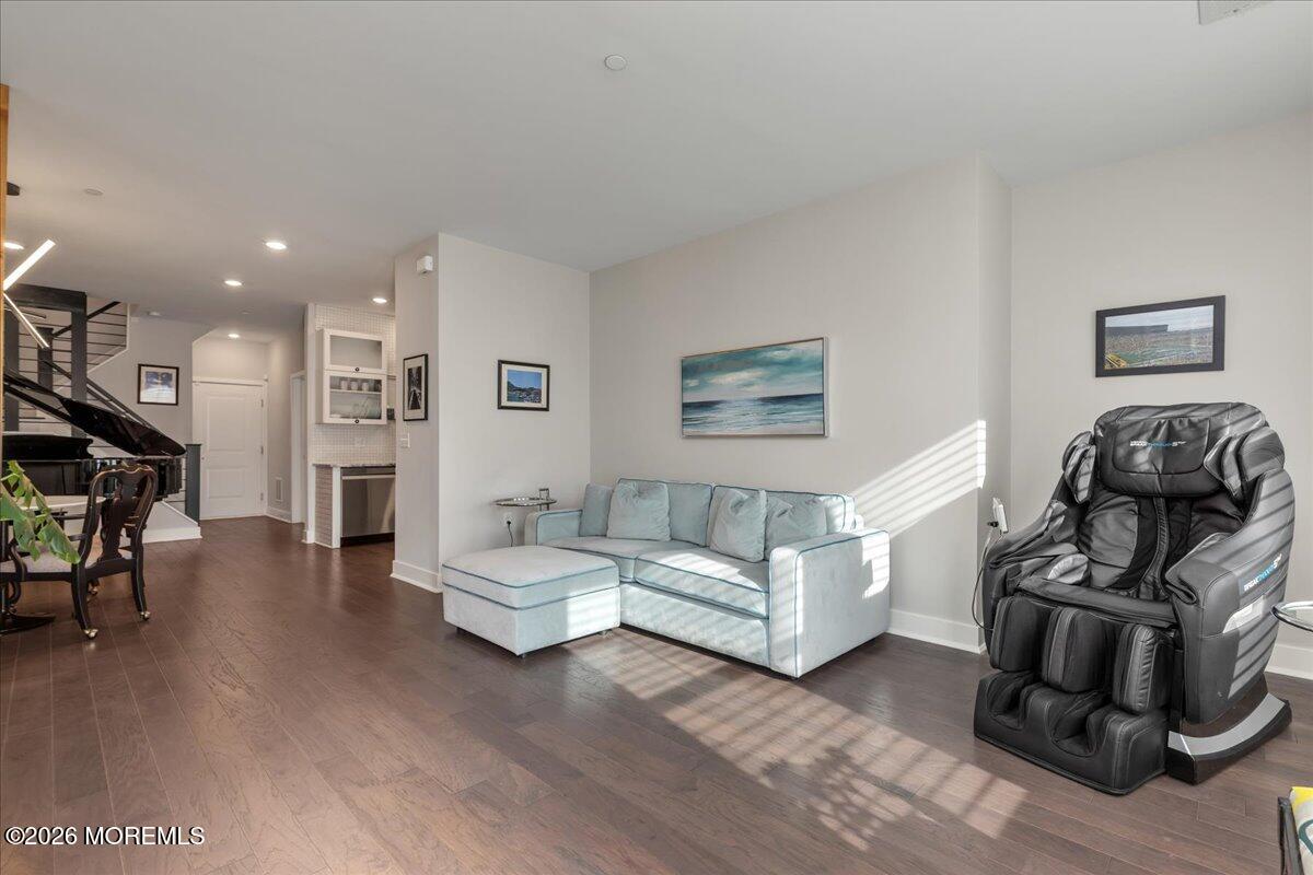 29 Midway Road North Tinton Falls, NJ 07724 - Photo 2 of 37 a living room with furniture and a wooden floor