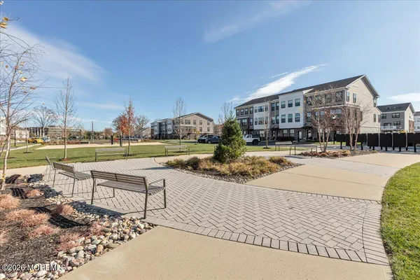 a view of swimming pool with outdoor seating