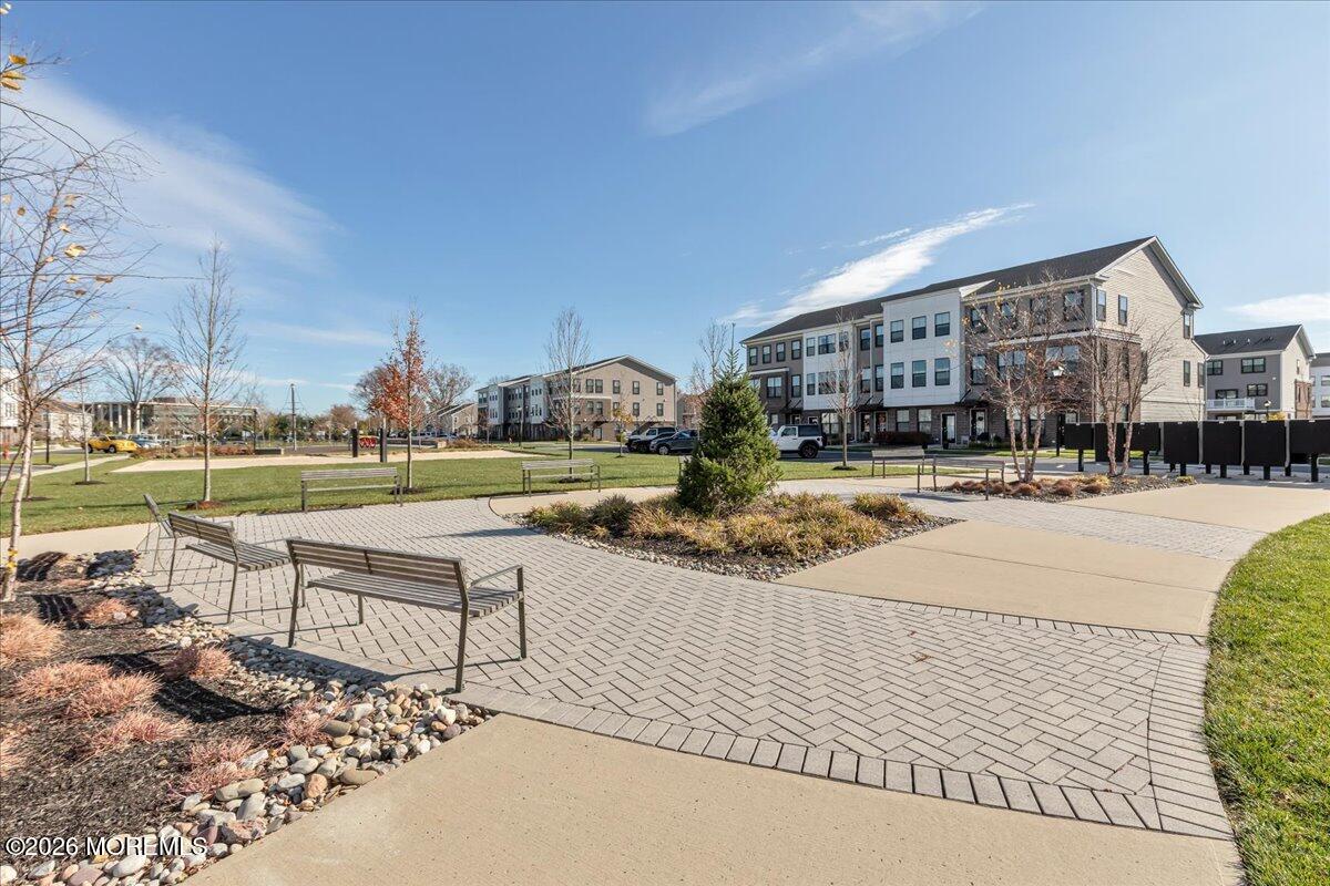 29 Midway Road North Tinton Falls, NJ 07724 - Photo 24 of 37 a swimming pool with outdoor seating and yard