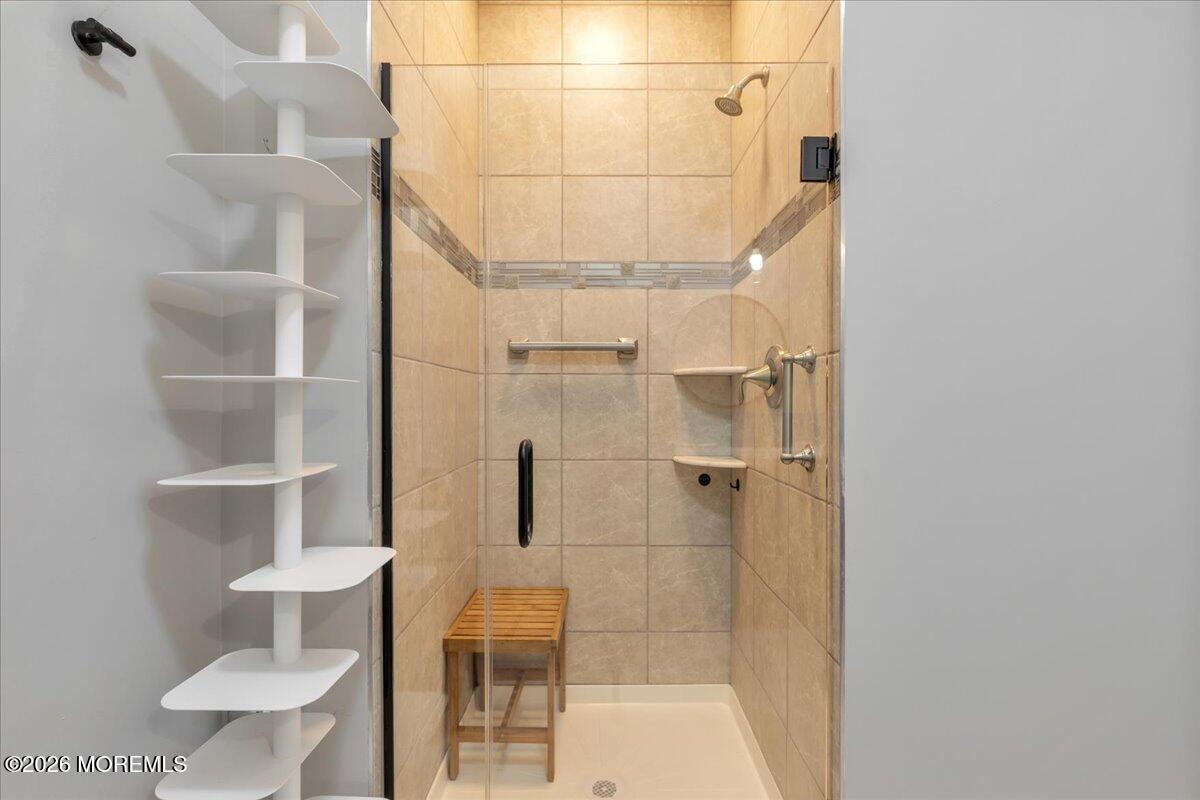 29 Midway Road North Tinton Falls, NJ 07724 - Photo 31 of 37 a bathroom with a toilet and a shower