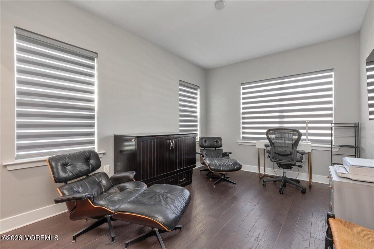 29 Midway Road North Tinton Falls, NJ 07724 - Photo 32 of 37 a livingroom with workspace and a couch