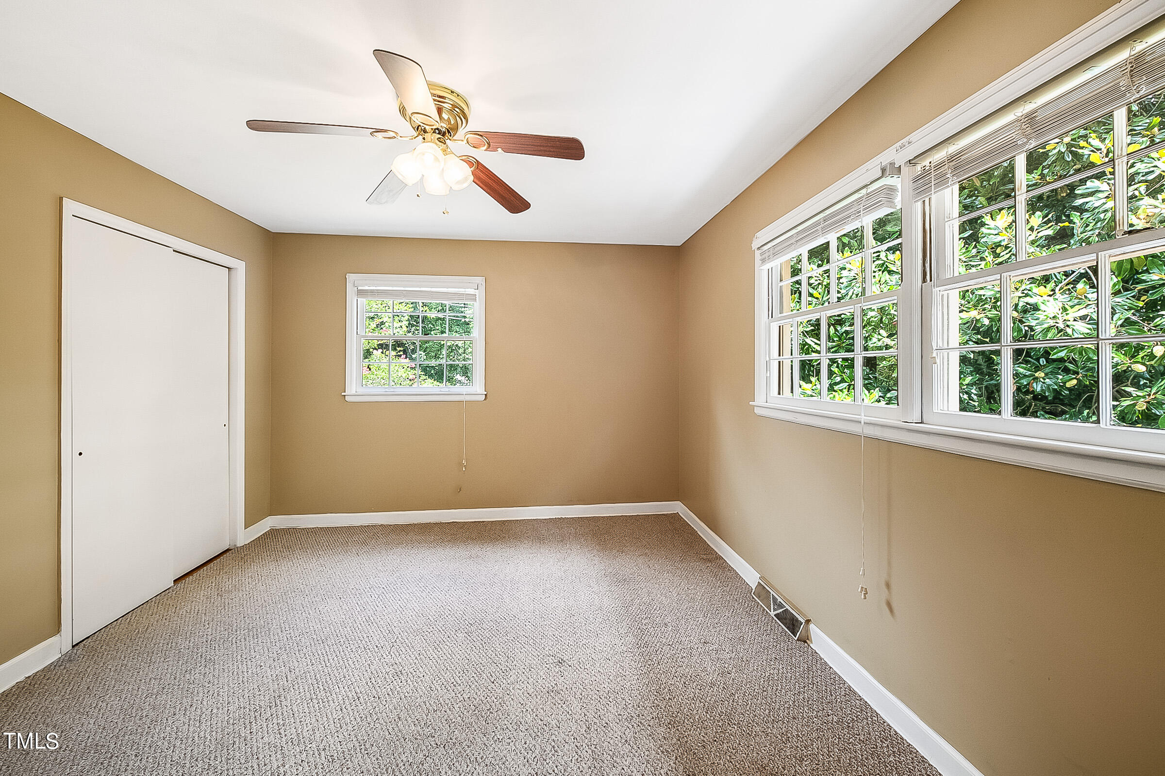 2512 Sparger Road Durham, NC 27705 - Photo 11 of 29 a view of an empty room with a window
