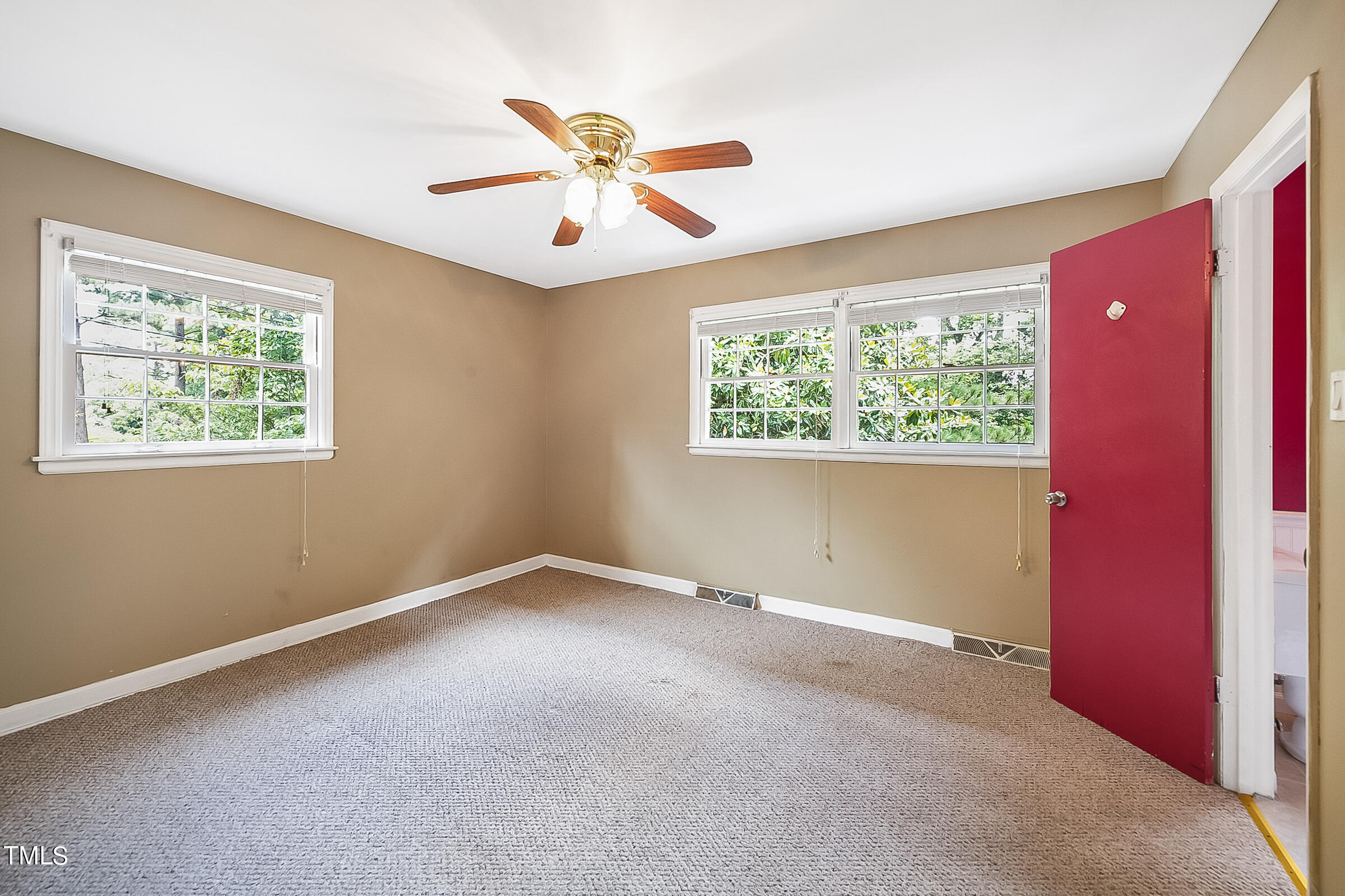 2512 Sparger Road Durham, NC 27705 - Photo 12 of 29 a view of an empty room with a window
