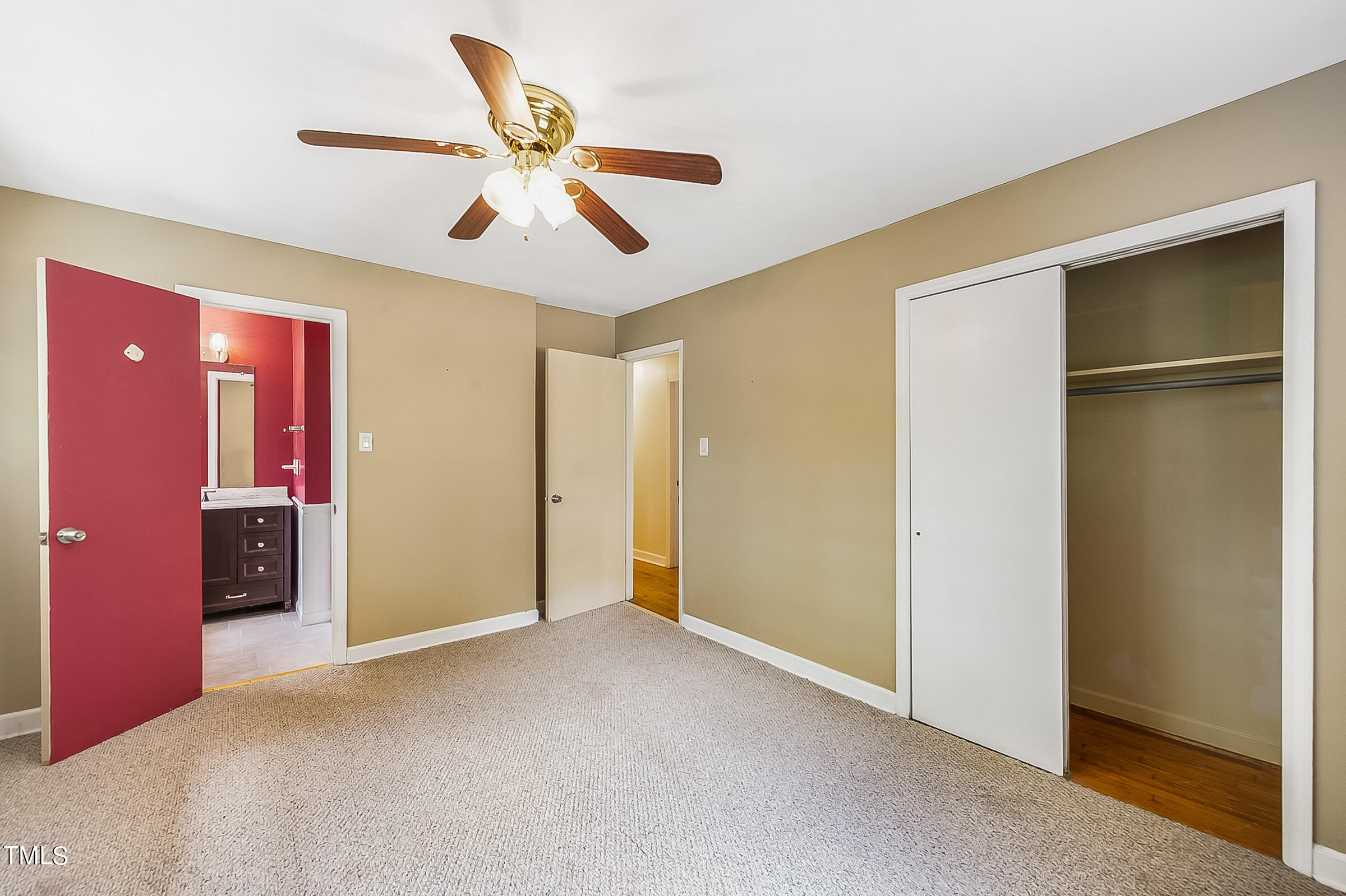 2512 Sparger Road Durham, NC 27705 - Photo 13 of 29 a view of an empty room with a ceiling fan