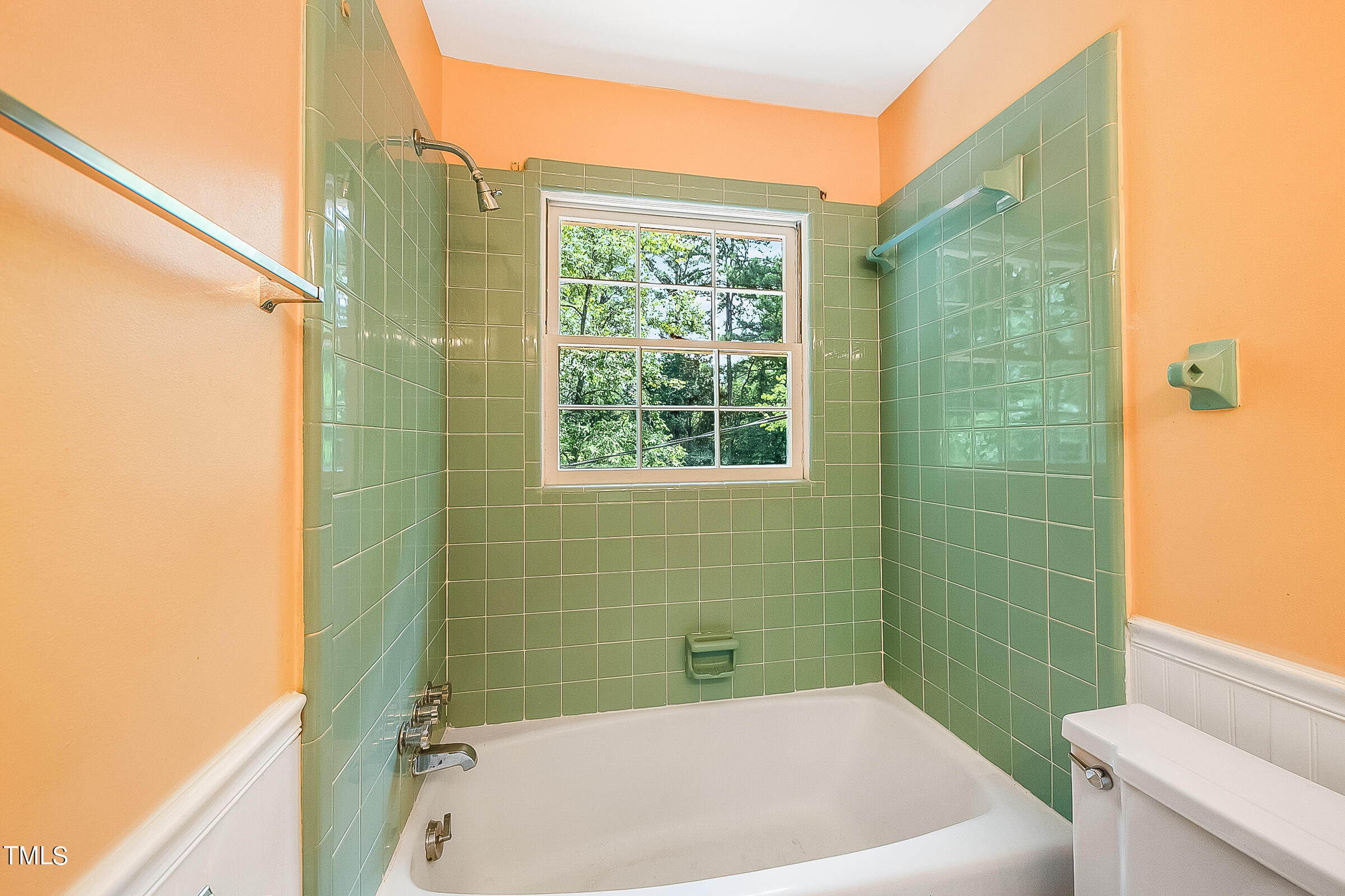 2512 Sparger Road Durham, NC 27705 - Photo 21 of 29 a bathroom with a bath tub and a shower