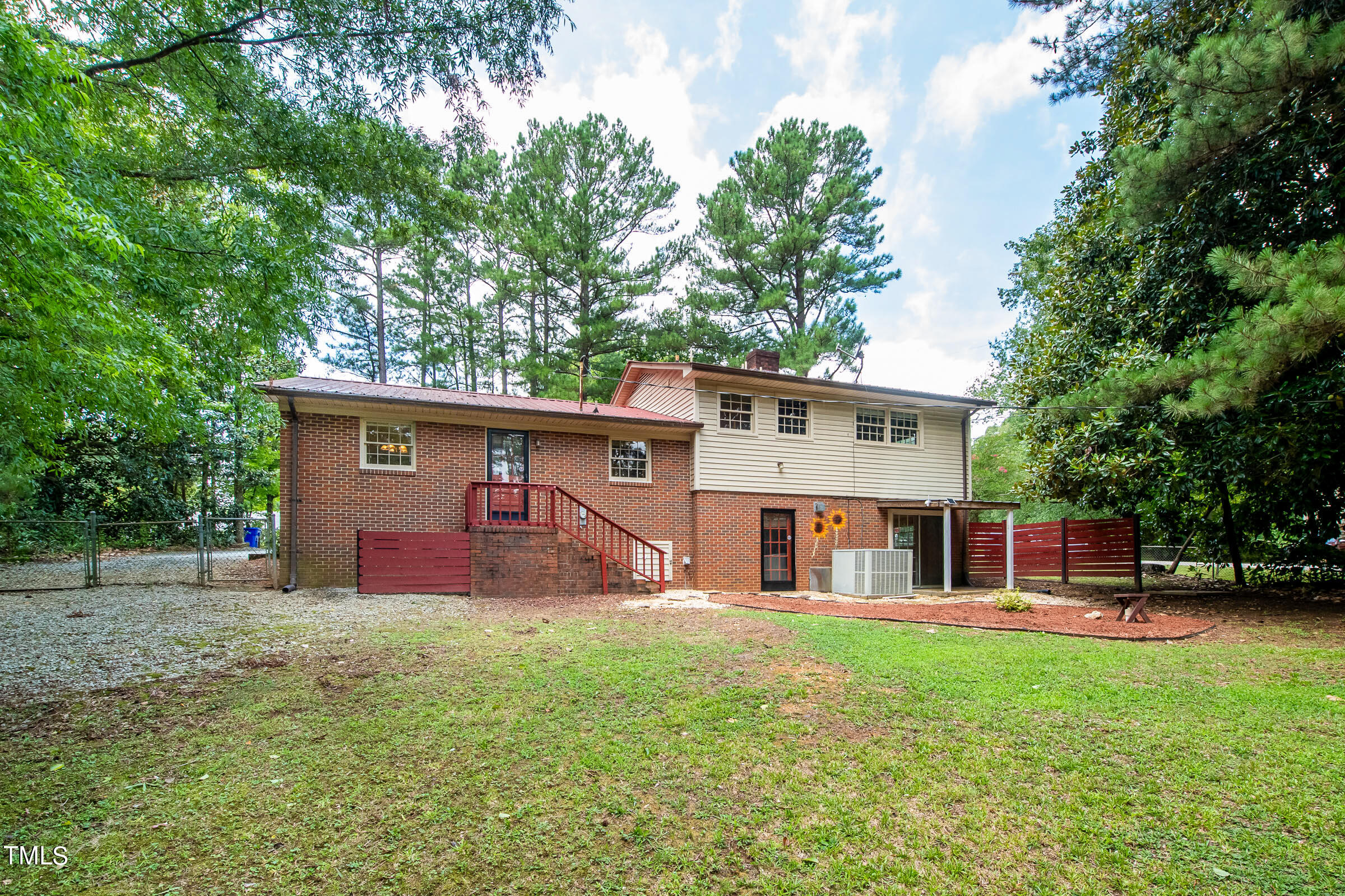 2512 Sparger Road Durham, NC 27705 - Photo 28 of 29 front view of a house with a yard