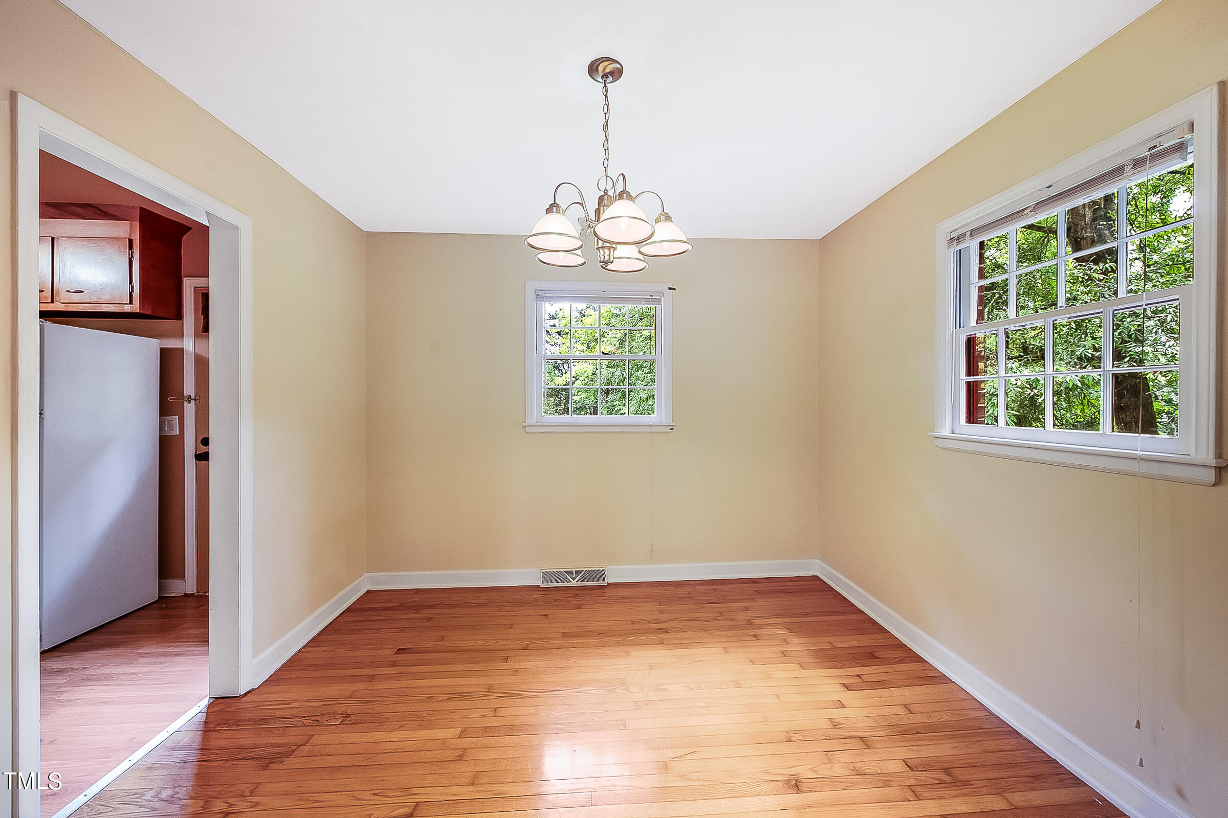 2512 Sparger Road Durham, NC 27705 - Photo 8 of 29 a view of an empty room with a window