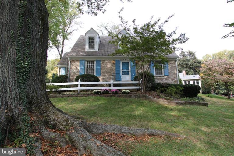 9518 Clement Road Silver Spring, MD 20910 - Photo 14 of 27 a front view of a house with garden