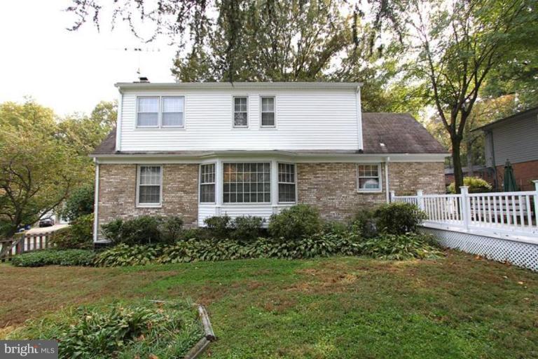 9518 Clement Road Silver Spring, MD 20910 - Photo 23 of 27 a front view of a house with garden