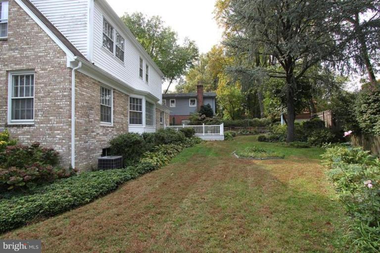 9518 Clement Road Silver Spring, MD 20910 - Photo 27 of 27 a front view of a house with a yard and trees