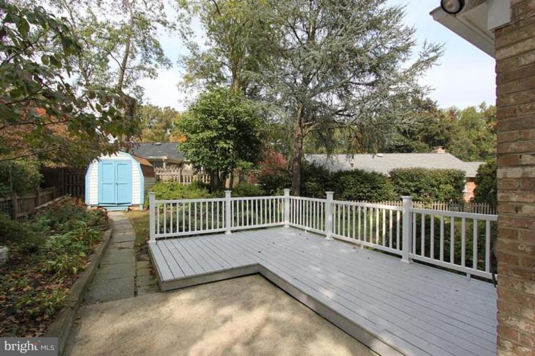 9518 Clement Road Silver Spring, MD 20910 - Photo 8 of 27 a view of a roof deck with wooden fence and floor