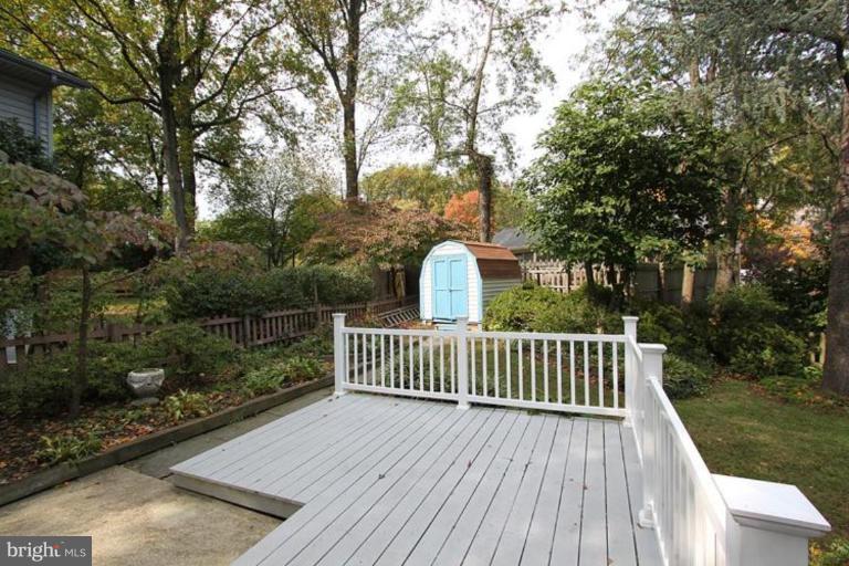 9518 Clement Road Silver Spring, MD 20910 - Photo 9 of 27 a view of backyard with deck and garden