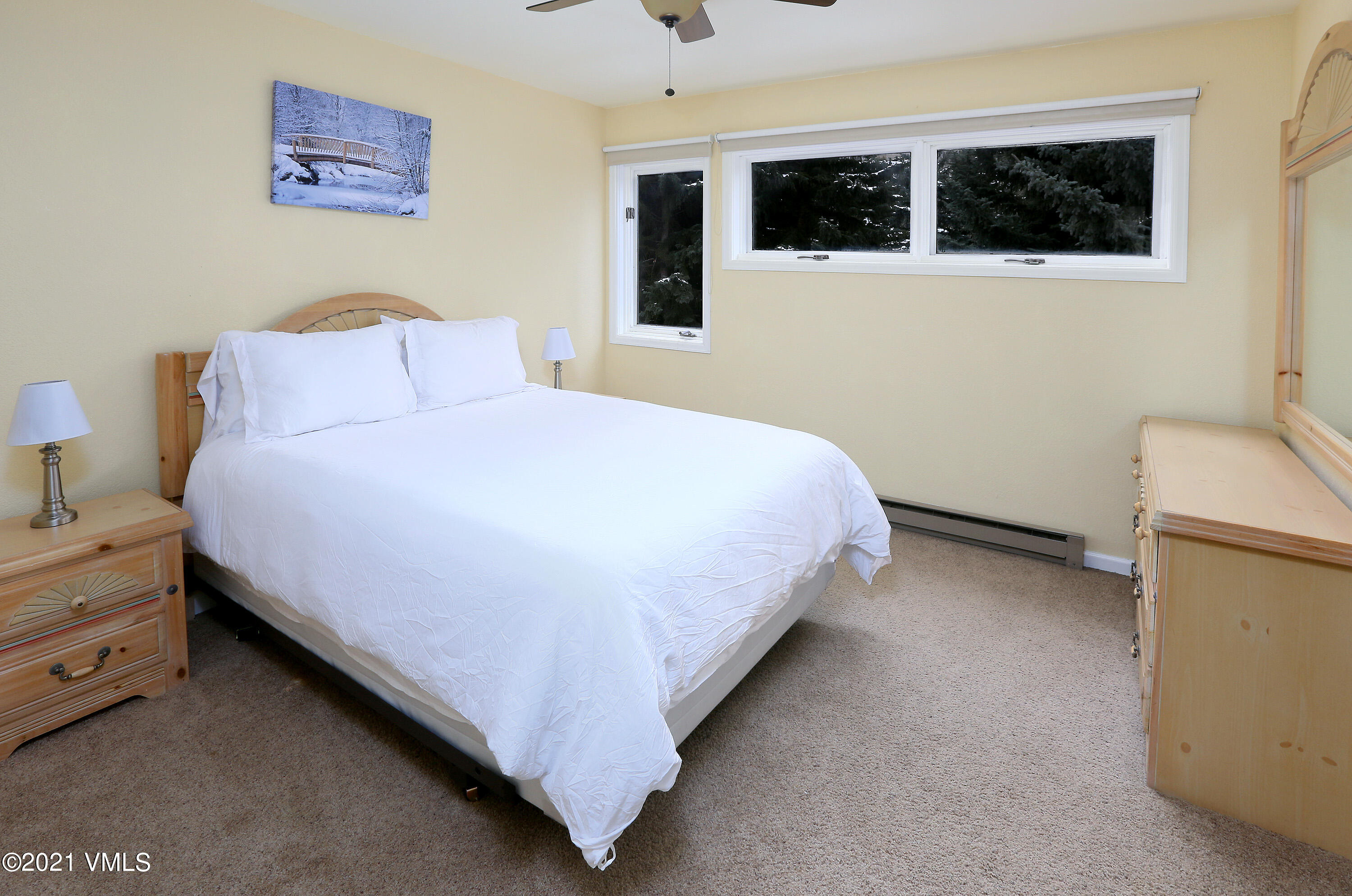 44 Eagle Road, Unit 2 Avon, CO 81620 - Photo 9 of 17 a bedroom with a bed and a window