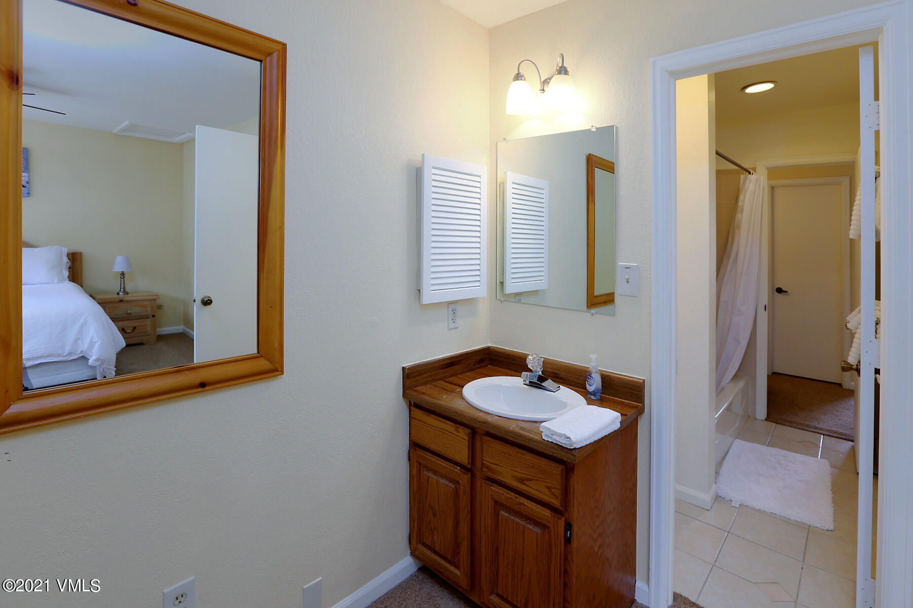 44 Eagle Road, Unit 2 Avon, CO 81620 - Photo 10 of 17 a bathroom with a sink and a mirror