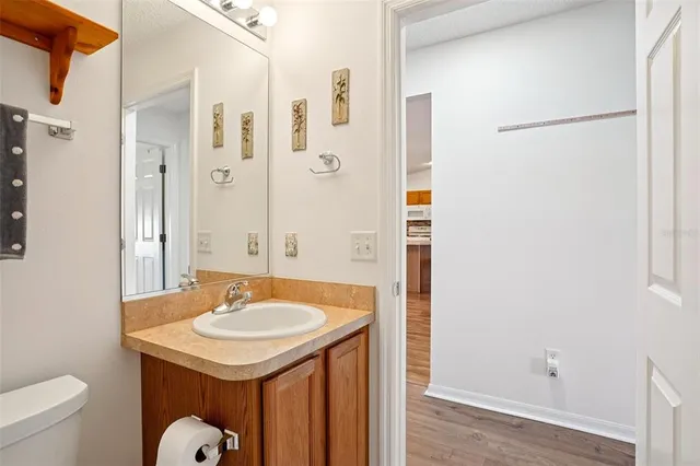 a bathroom with a sink and mirror