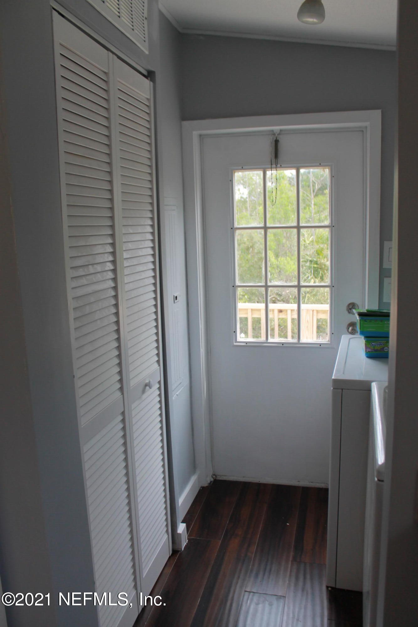 16006 Shellcracker Road Jacksonville, FL 32226 - Photo 14 of 41 a view of a small space with wooden floor and a window