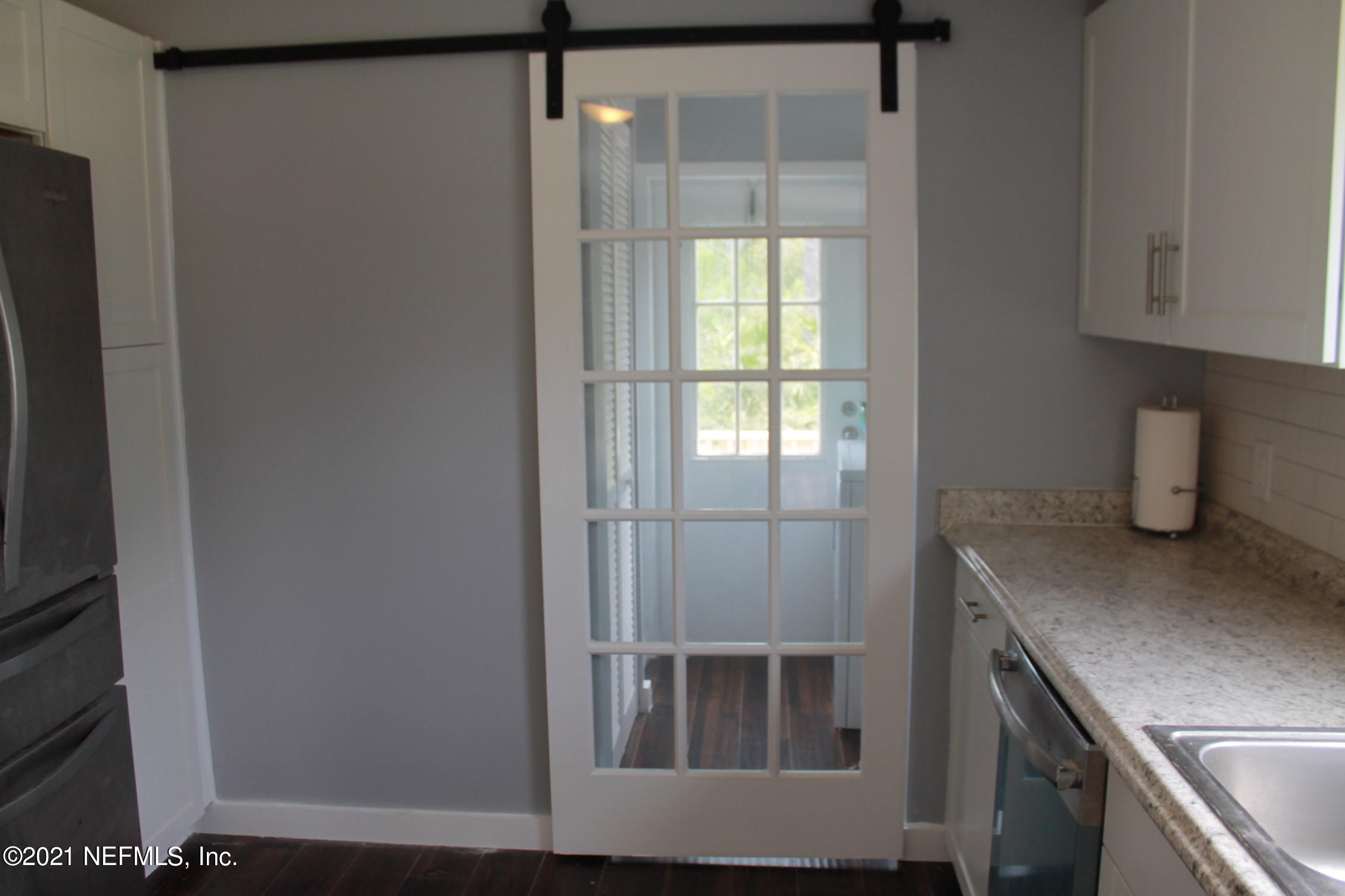 16006 Shellcracker Road Jacksonville, FL 32226 - Photo 15 of 41 a kitchen with a refrigerator and window