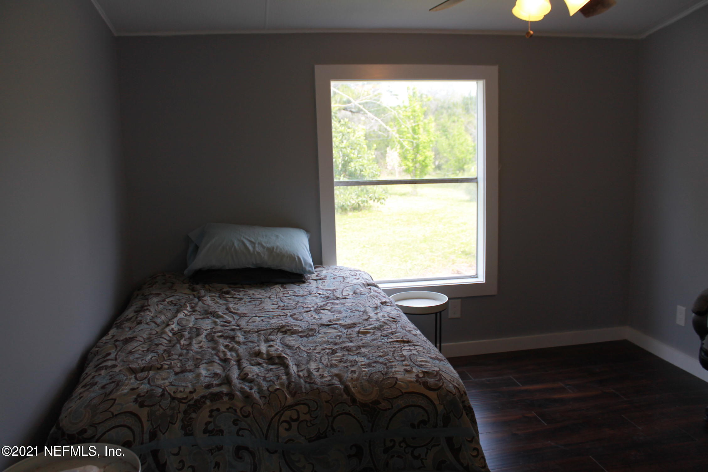 16006 Shellcracker Road Jacksonville, FL 32226 - Photo 17 of 41 a bedroom with a bed and a window