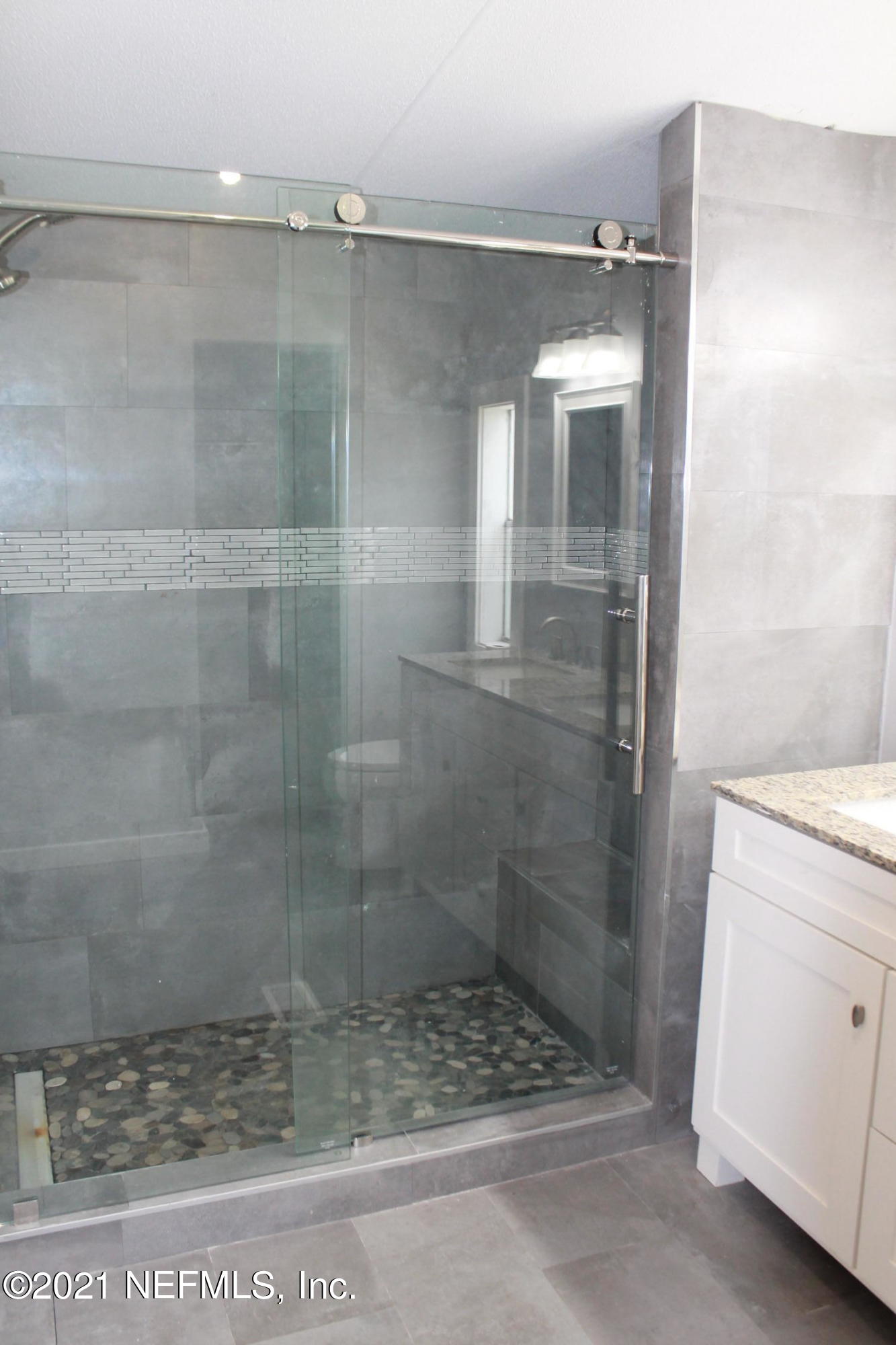 16006 Shellcracker Road Jacksonville, FL 32226 - Photo 19 of 41 a bathroom with a shower