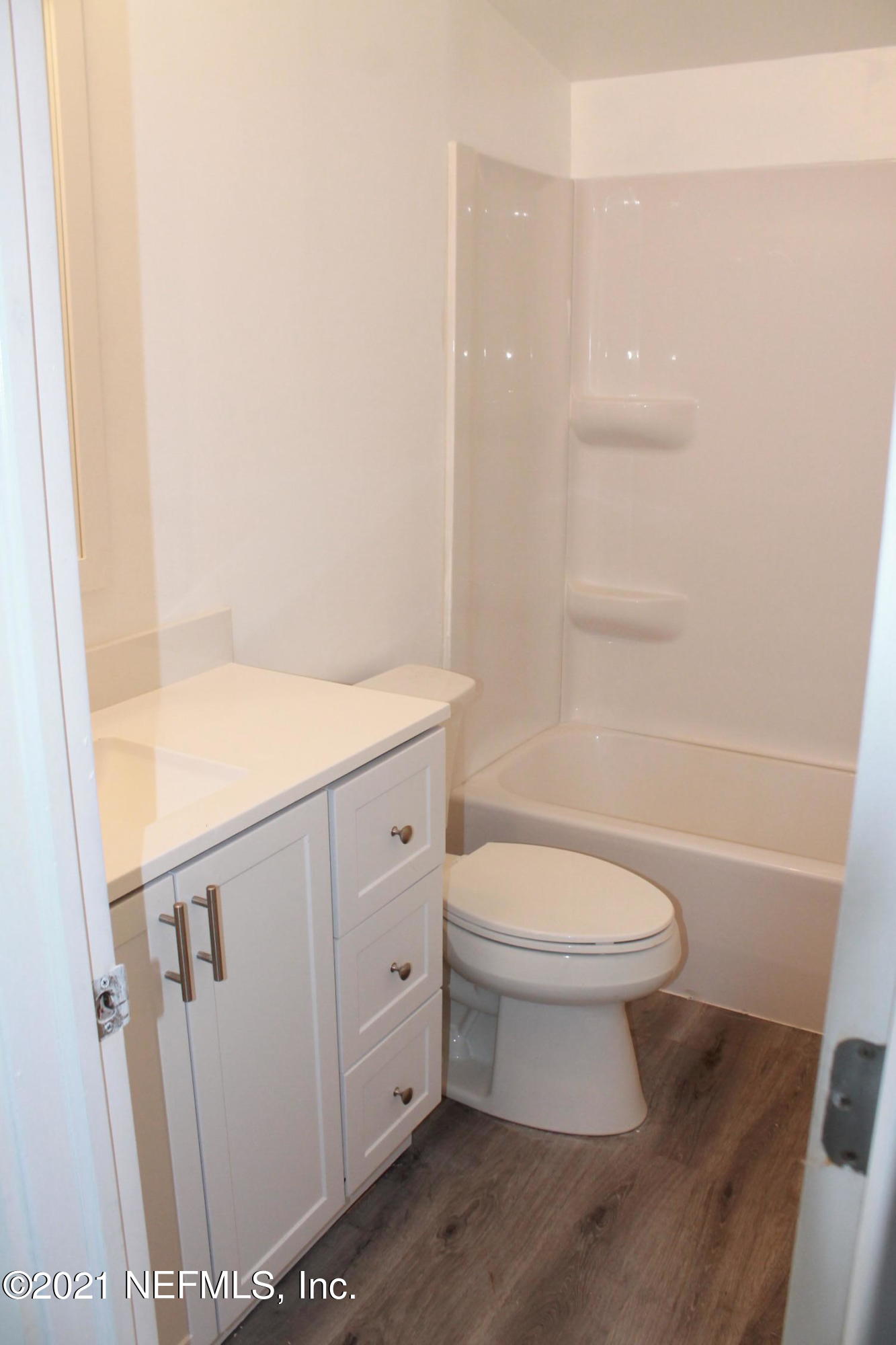 16006 Shellcracker Road Jacksonville, FL 32226 - Photo 29 of 41 a bathroom with a toilet a sink and a bathtub