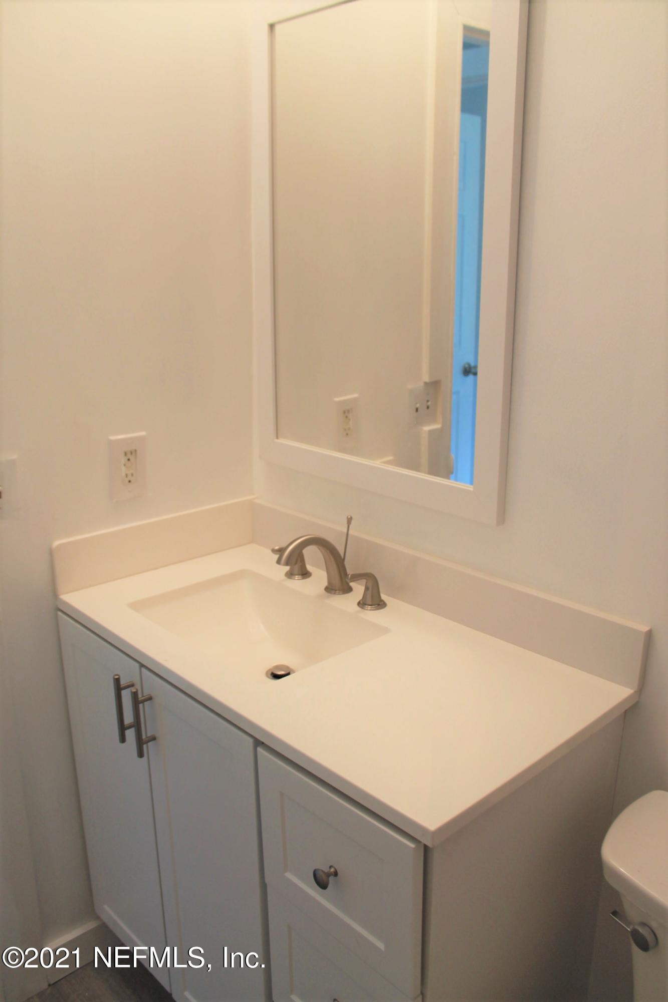 16006 Shellcracker Road Jacksonville, FL 32226 - Photo 30 of 41 a bathroom with a sink and a toilet
