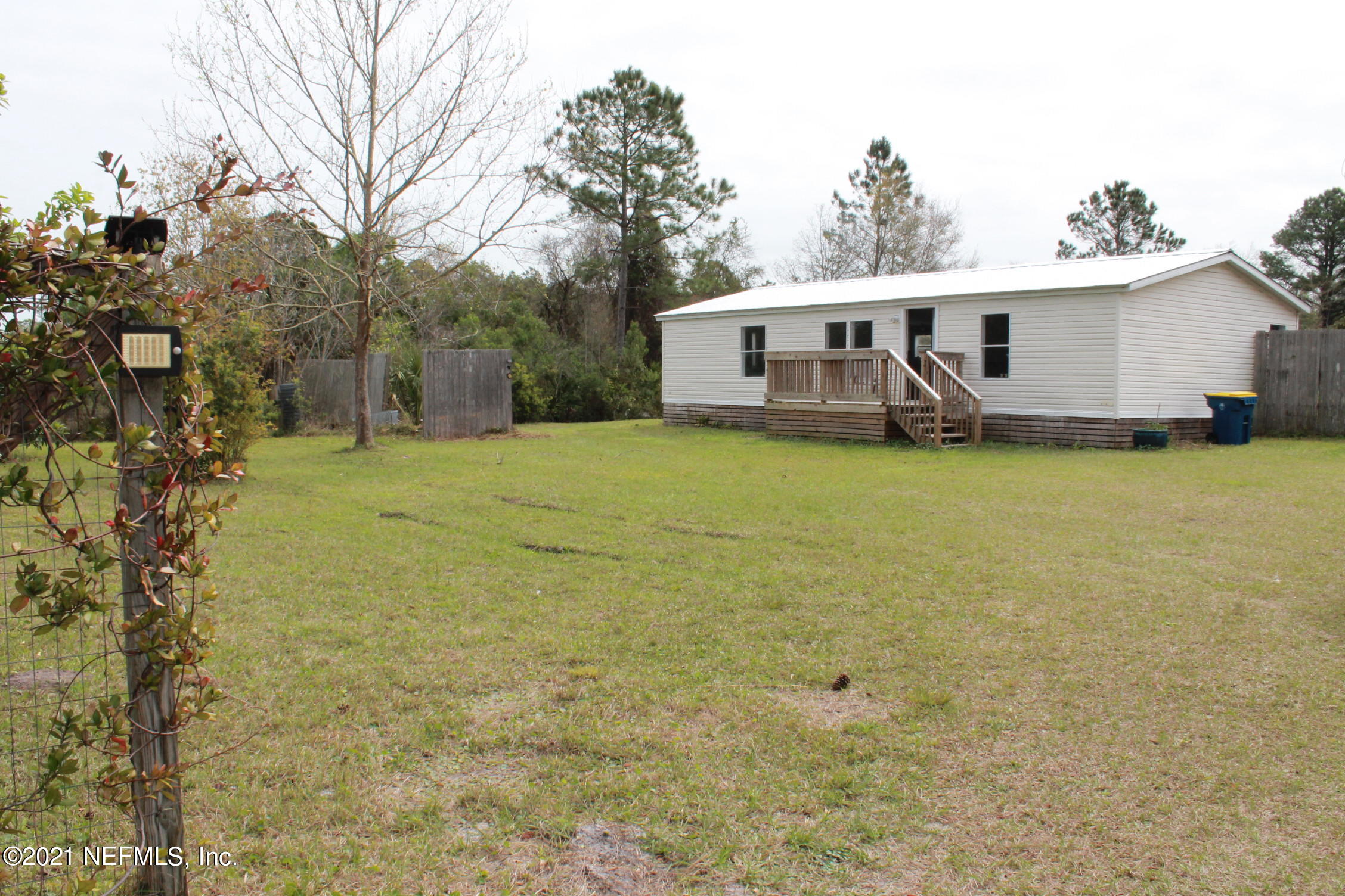 16006 Shellcracker Road Jacksonville, FL 32226 - Photo 32 of 41 a front view of a house with garden