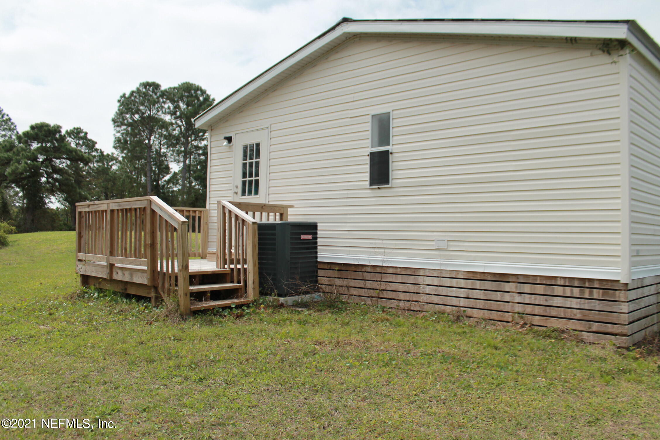 16006 Shellcracker Road Jacksonville, FL 32226 - Photo 33 of 41 a view of a house with a backyard
