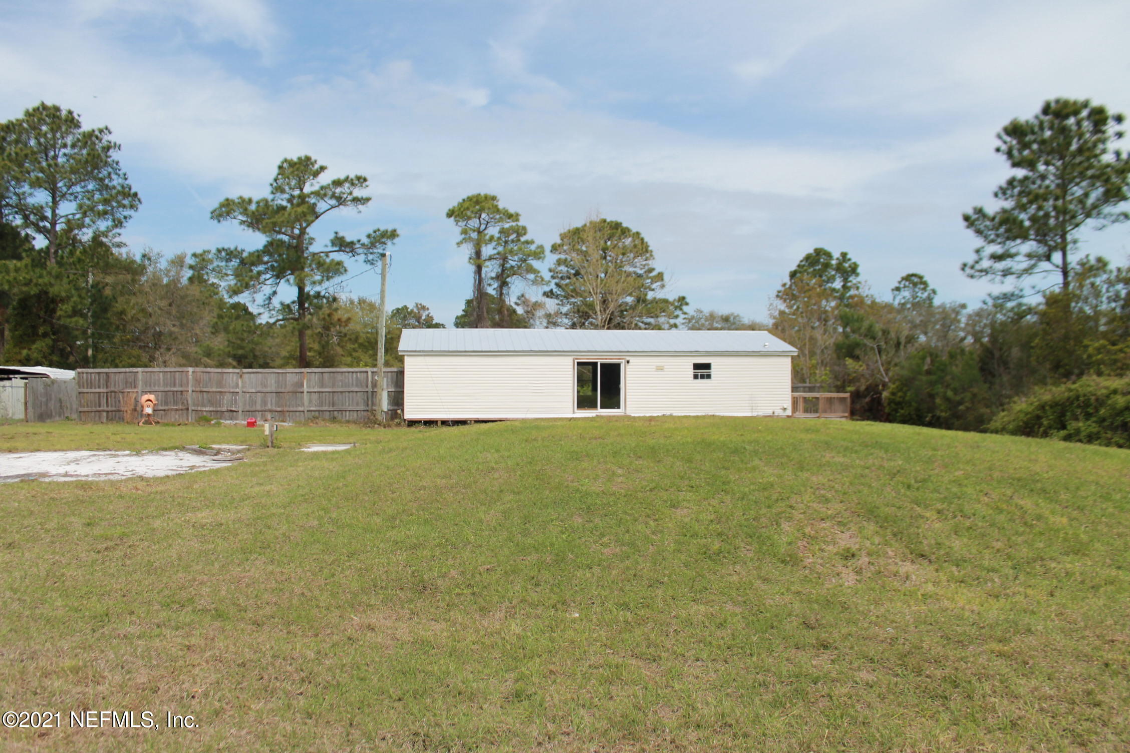 16006 Shellcracker Road Jacksonville, FL 32226 - Photo 35 of 41 a front view of a house with a yard