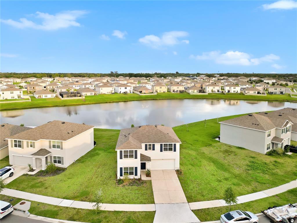 16636 Windmill Forge Pass Wimauma, FL 33598 - Photo 39 of 51 an aerial view of a house with a ocean view
