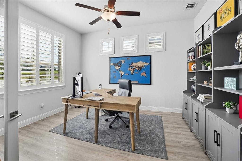 2721 Rotherham Street Prosper, TX 75078 - Photo 17 of 37 a view of a workspace with furniture and a window