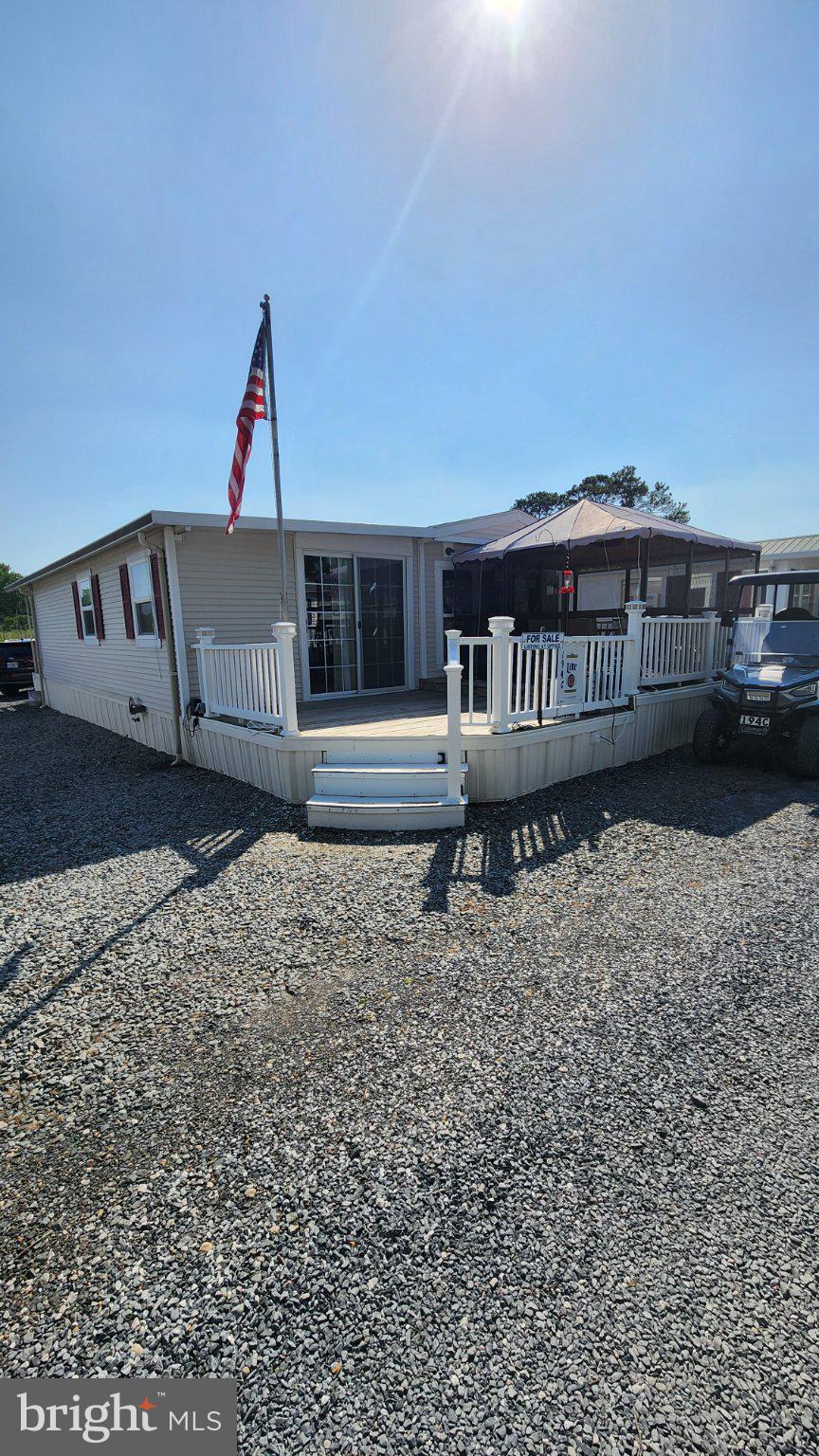 111 Beach Harbor Road, Unit 194C Grasonville, MD 21638 - Photo 1 of 24 Charming home with inviting porch.