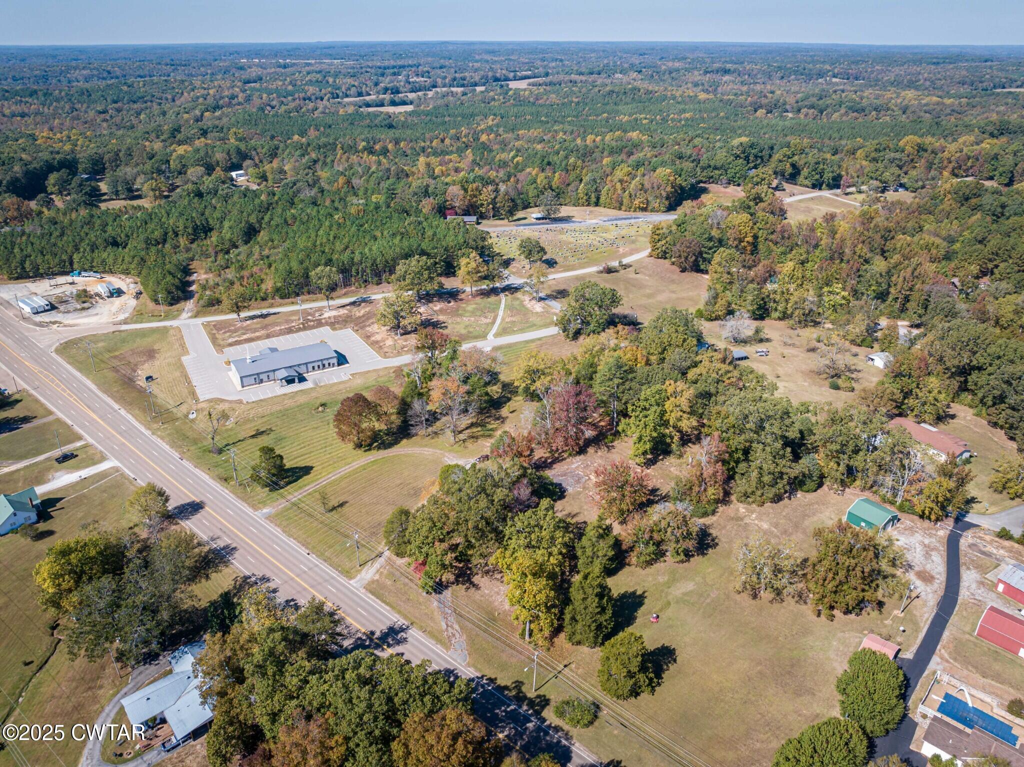 0 West Main Street Parsons, TN 38363 - Photo 4 of 15 an aerial view of residential houses with outdoor space