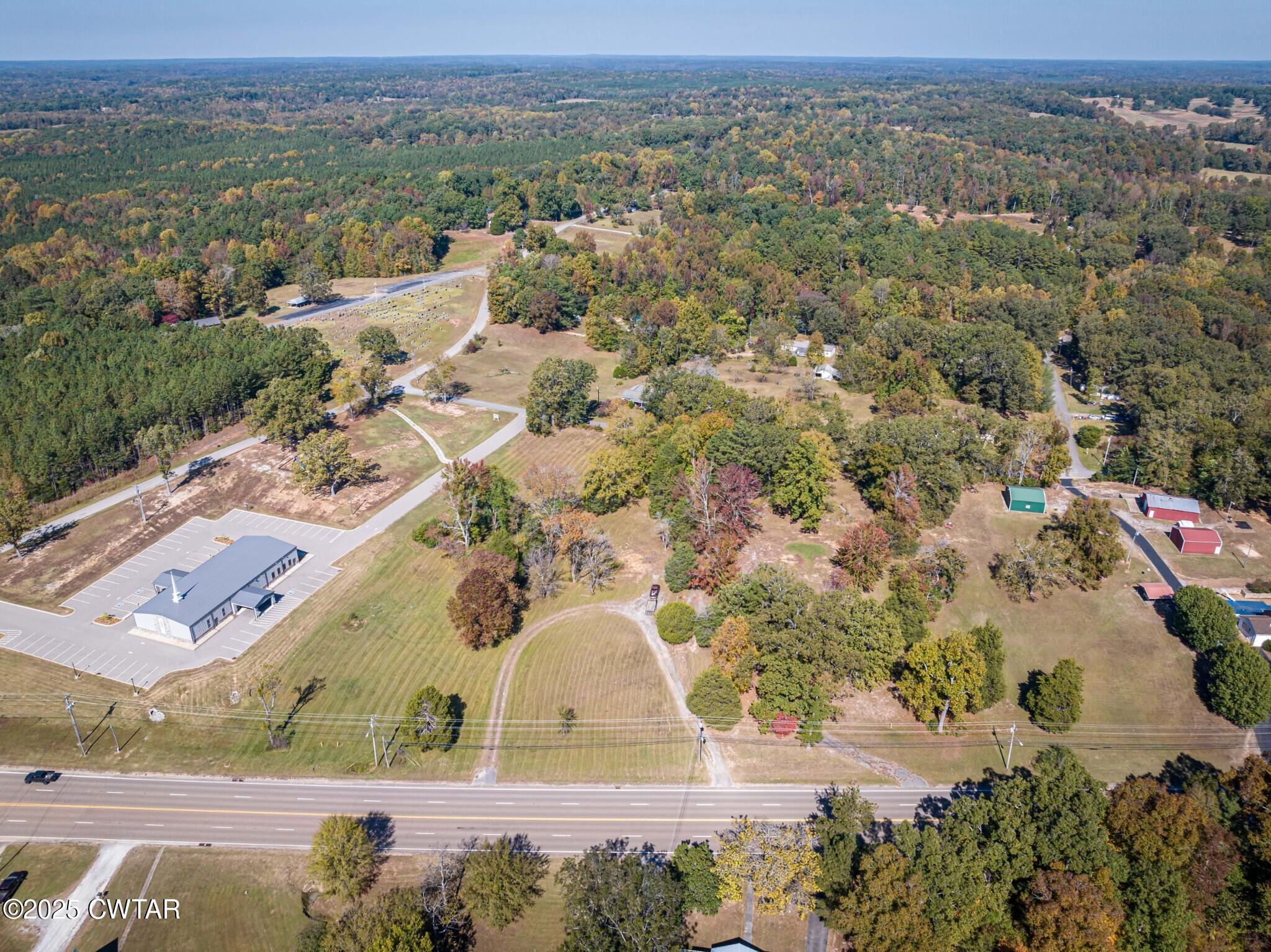0 West Main Street Parsons, TN 38363 - Photo 5 of 15 an aerial view of residential houses with outdoor space