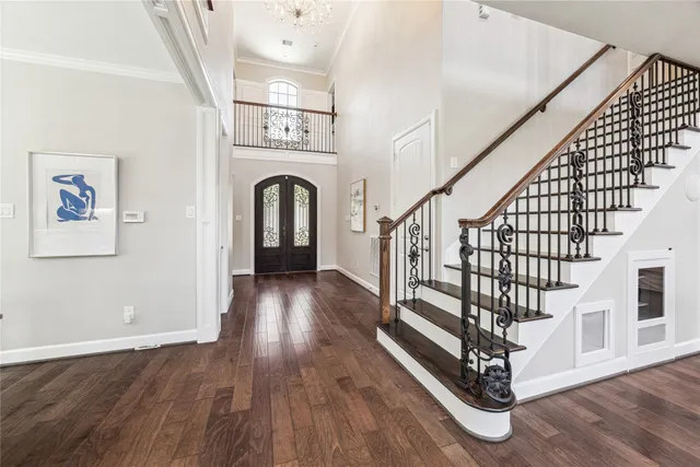 a view of entryway with wooden floor
