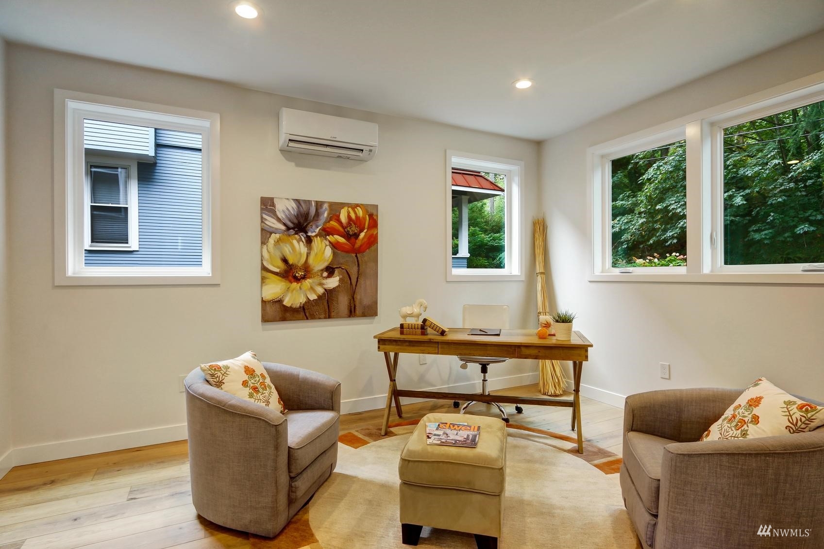 3838 36th Avenue West Seattle, WA 98199 - Photo 11 of 24 a living room with furniture and a window