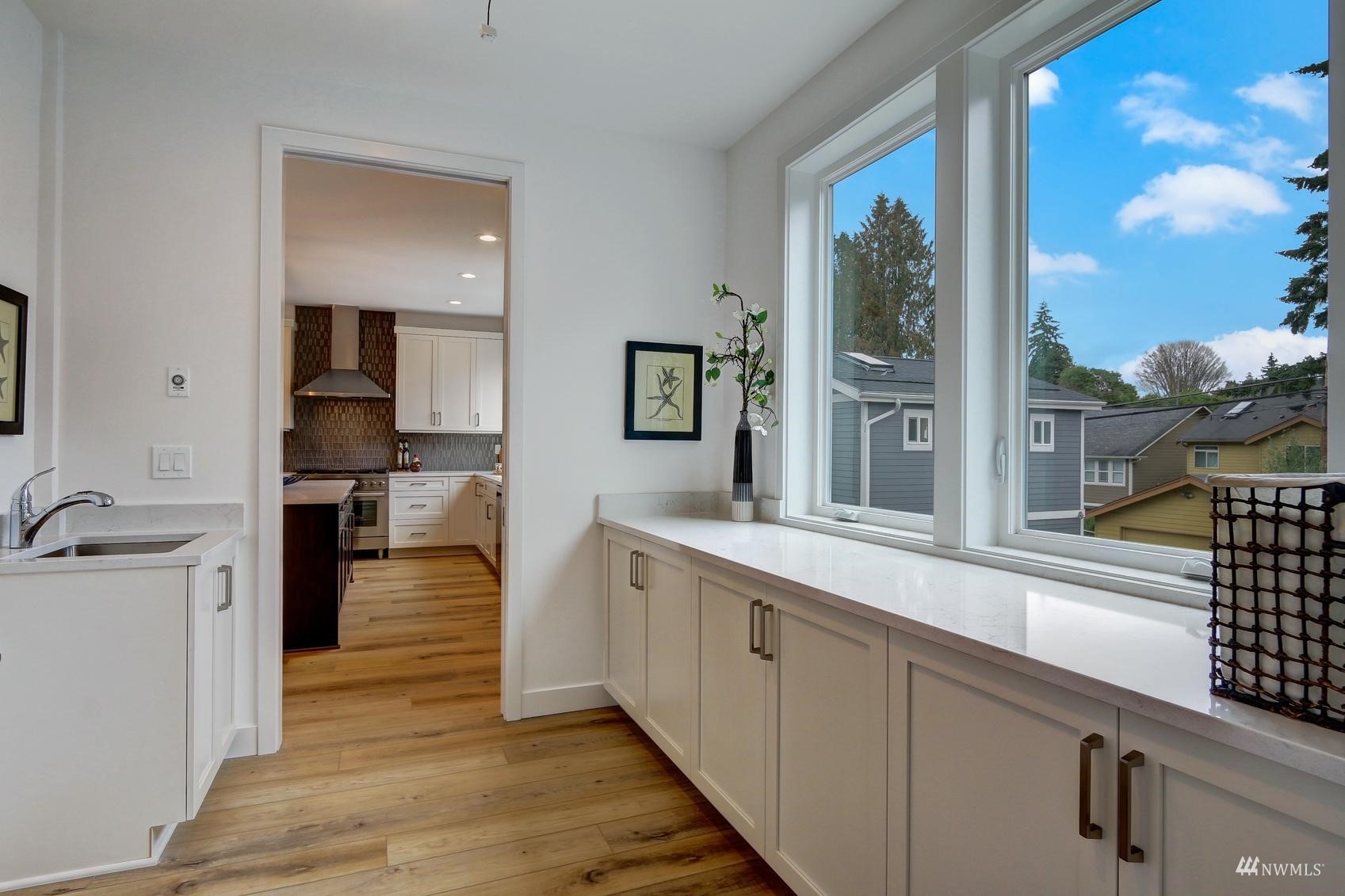 3838 36th Avenue West Seattle, WA 98199 - Photo 13 of 24 a view of a kitchen from the hallway