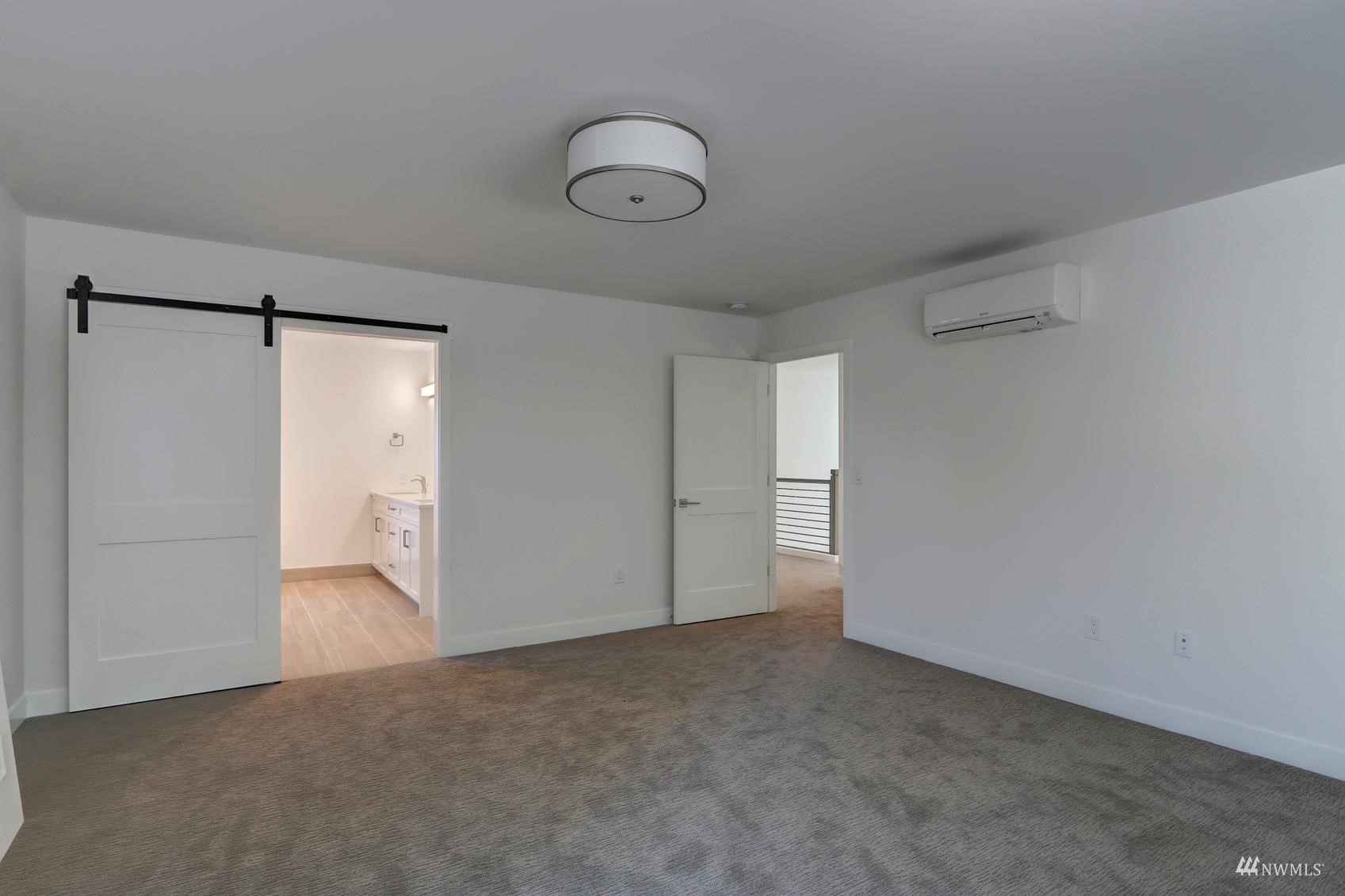 3838 36th Avenue West Seattle, WA 98199 - Photo 16 of 24 a view of an empty room