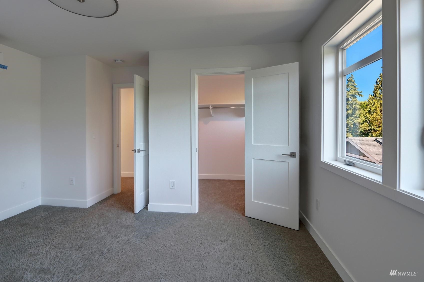 3838 36th Avenue West Seattle, WA 98199 - Photo 22 of 24 a view of an empty room with windows