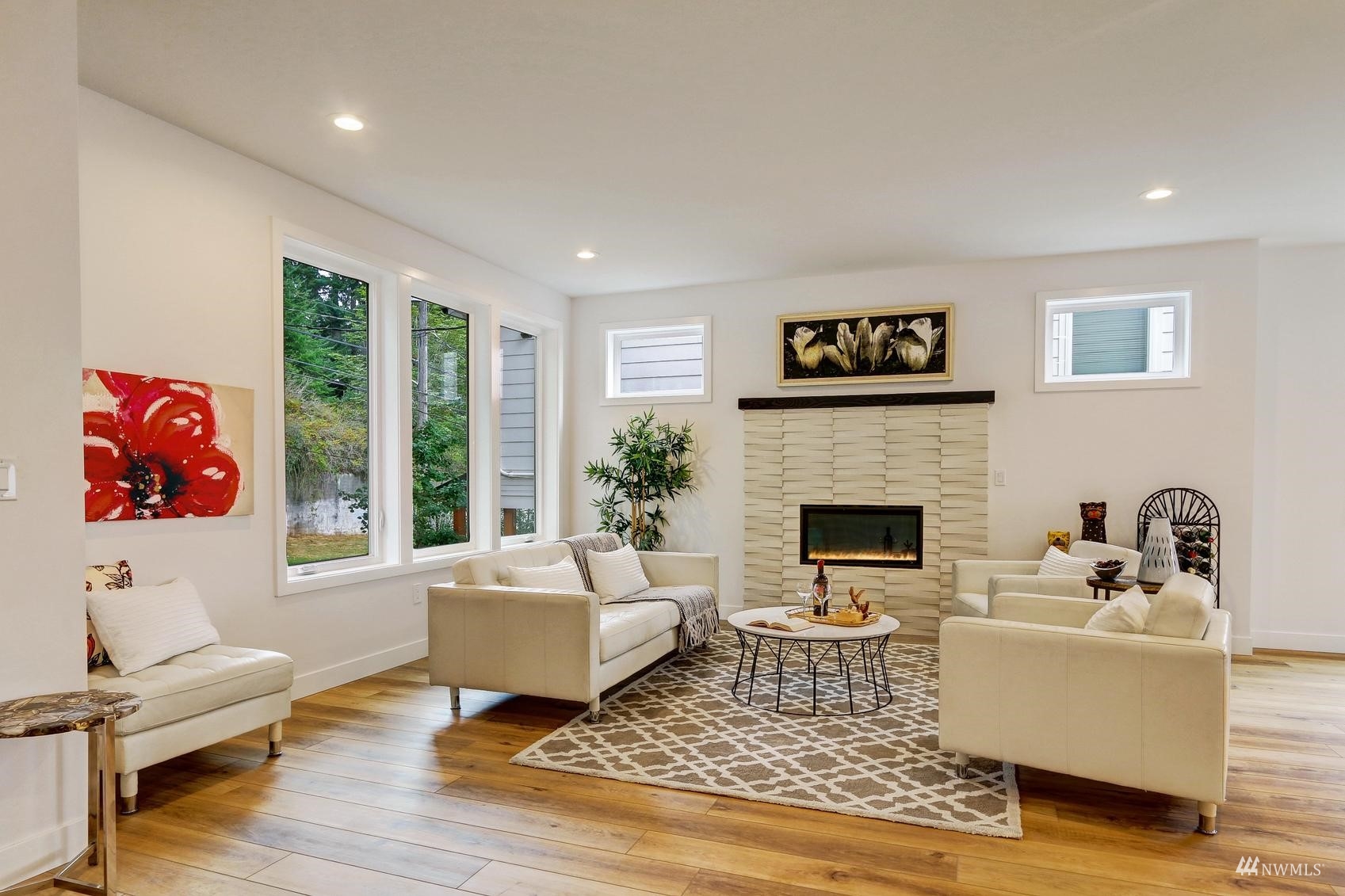 3838 36th Avenue West Seattle, WA 98199 - Photo 7 of 24 a living room with furniture fireplace and window