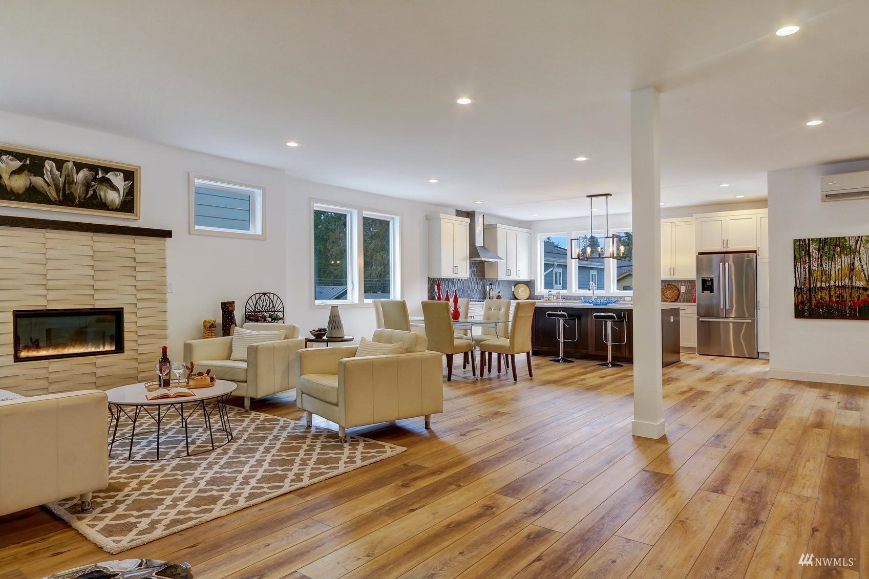 3838 36th Avenue West Seattle, WA 98199 - Photo 9 of 24 a living room with furniture and a fireplace