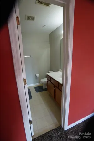 a bathroom with a sink and toilet