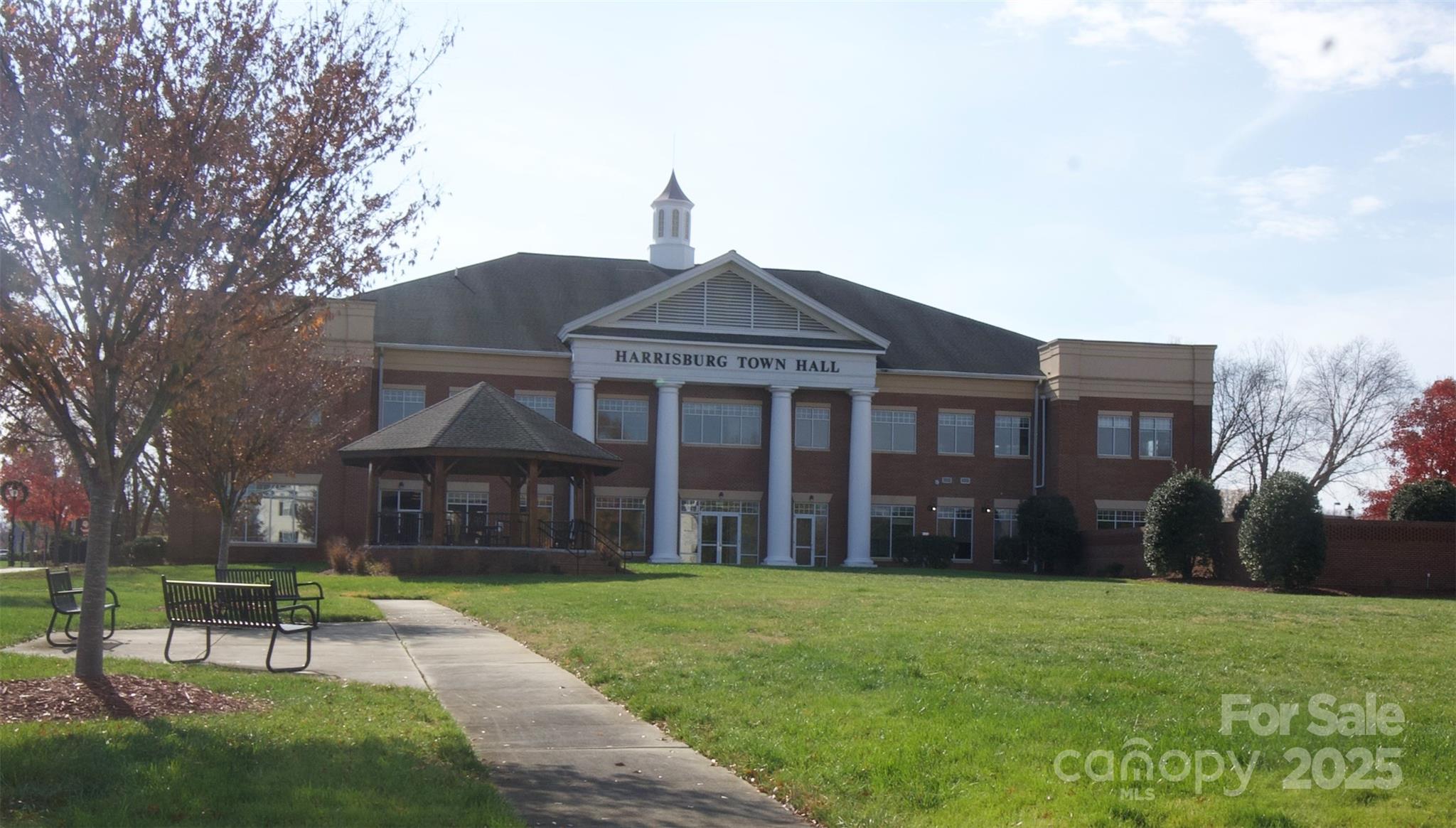 4010 Town Center Road Harrisburg, NC 28075 - Photo 10 of 13 a front view of a house with a yard table and chairs