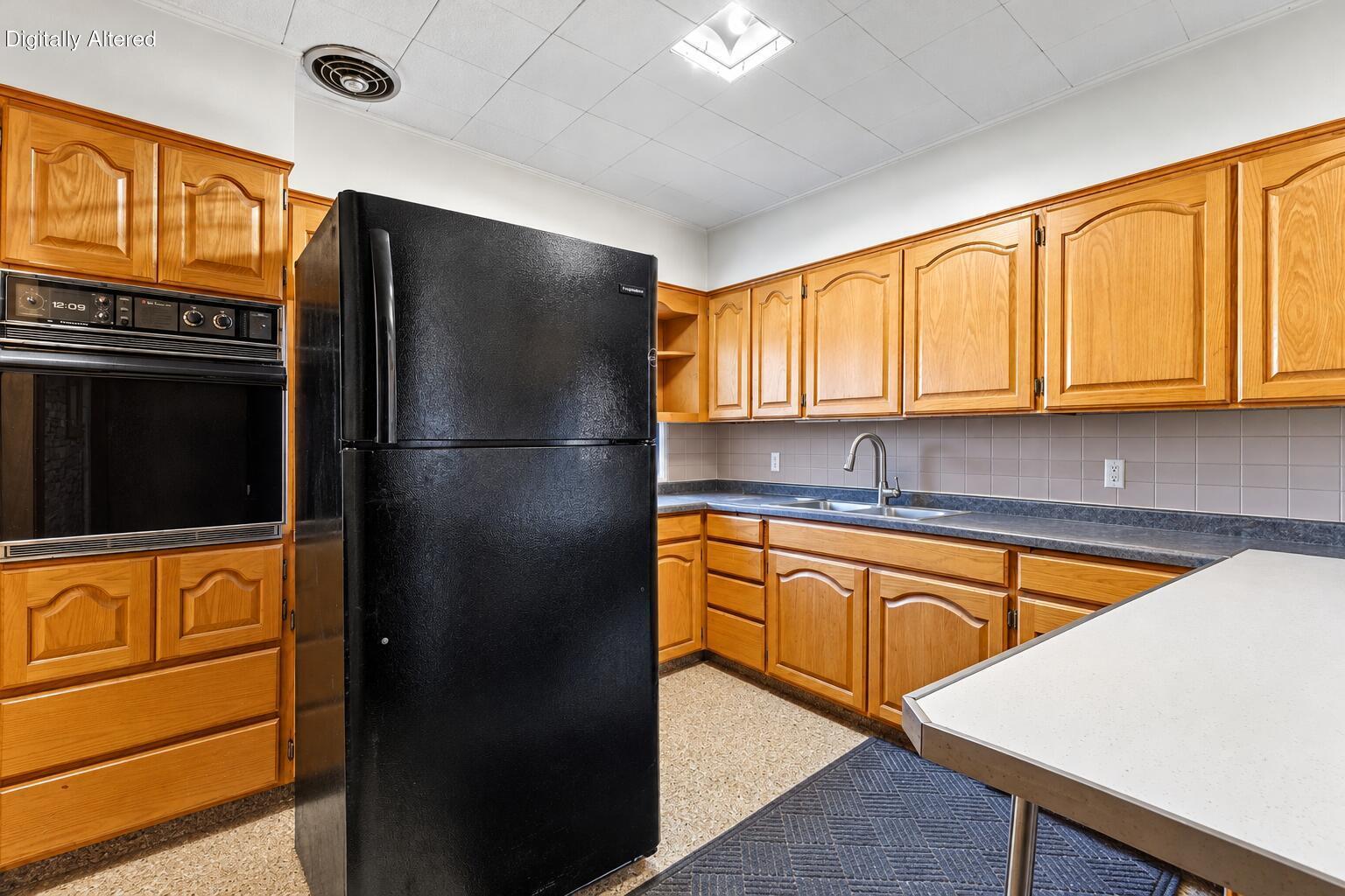 2063 Mt Pleasant Street Racine, WI 53404 - Photo 7 of 24 Warm Oak U-Shaped Kitchen Interior