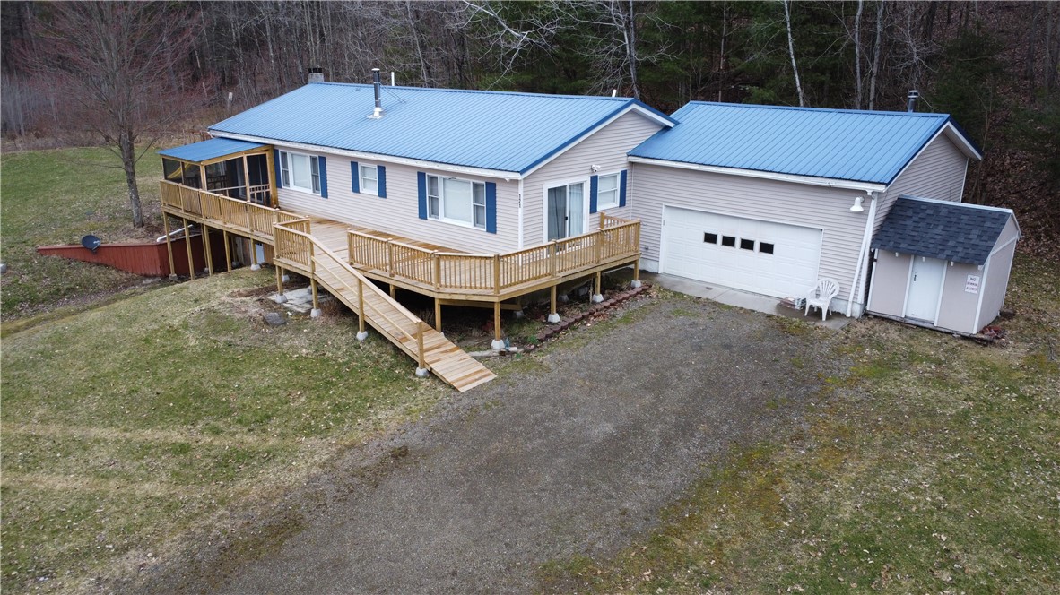121 Shanty Town Road Oneonta, NY 13820 - Photo 1 of 1 left side shows the retaining wall and entry to basement