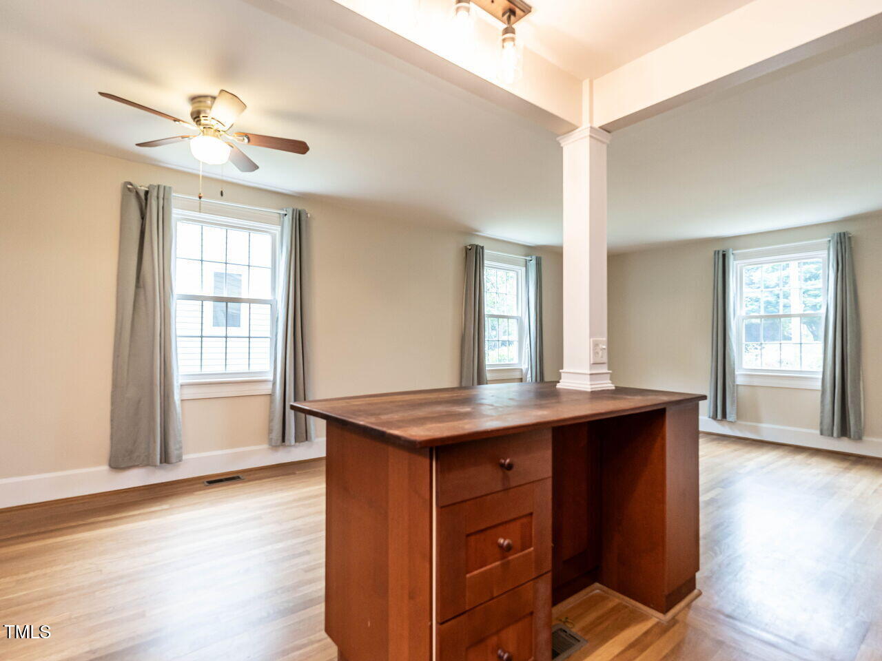 412 Morrison Avenue Raleigh, NC 27608 - Photo 11 of 26 a view of kitchen with cabinets and wooden floor