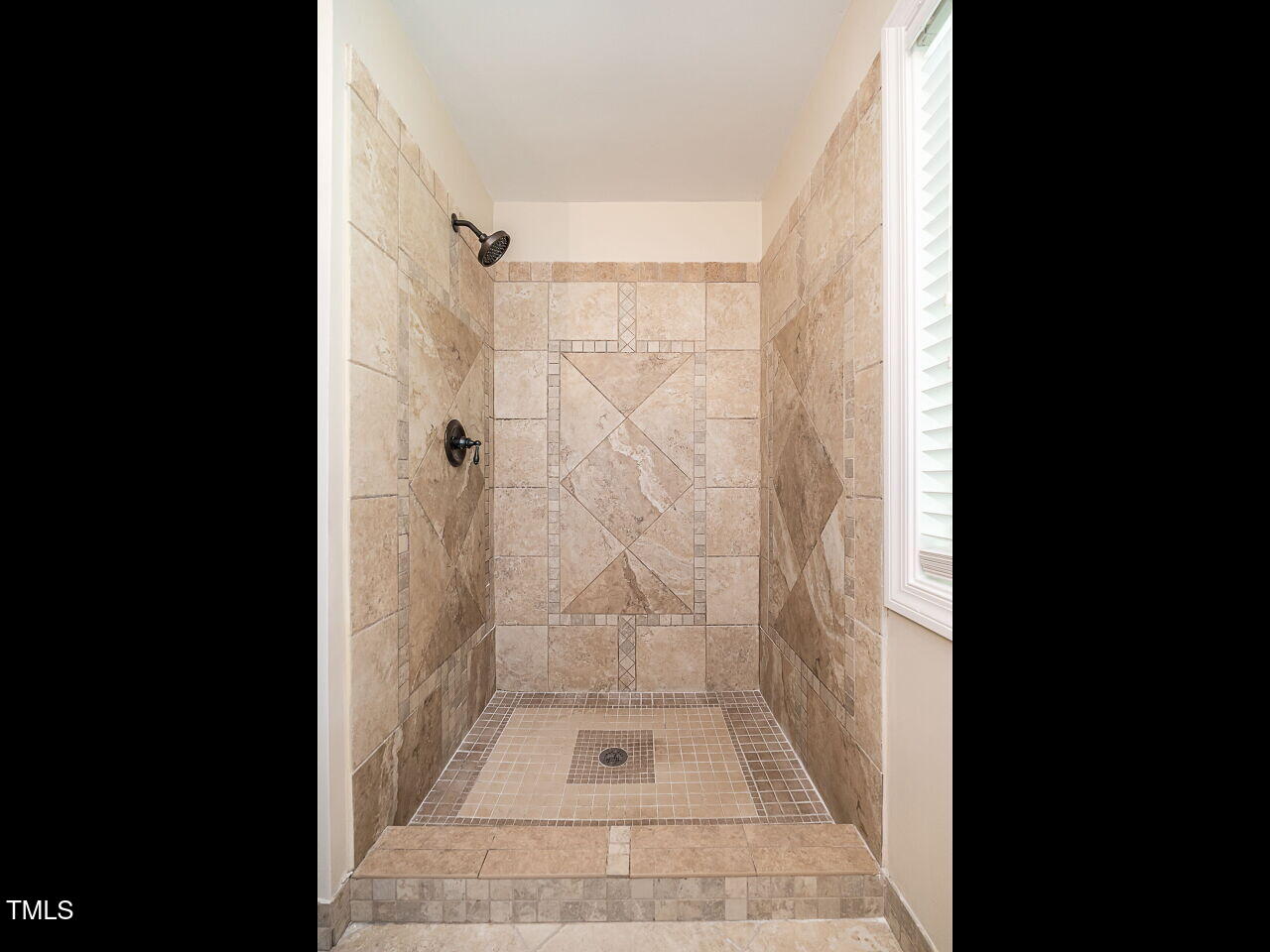 412 Morrison Avenue Raleigh, NC 27608 - Photo 16 of 26 a bathroom with a shower
